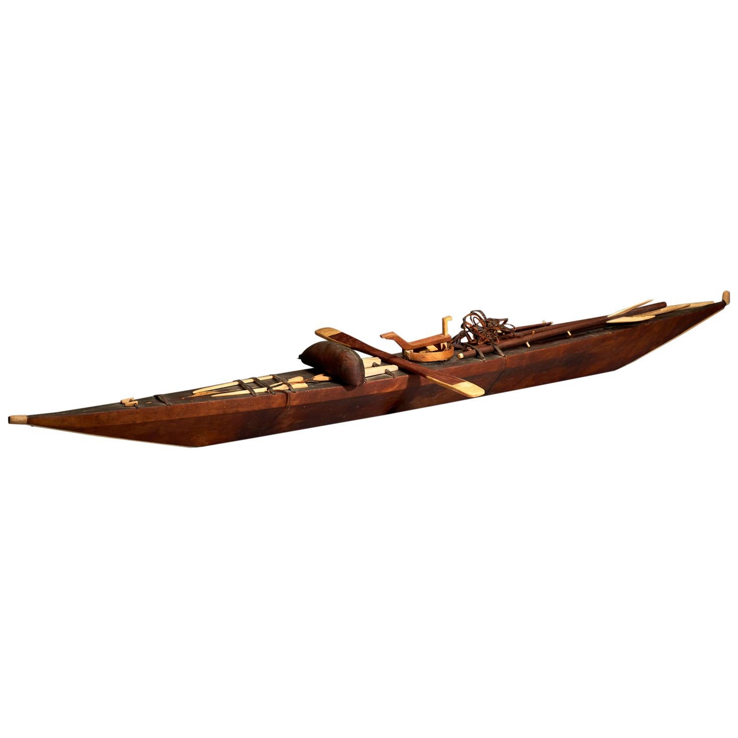 Eskimo Model Kayak, Wood Covered with Seal Skin, Lined with Bone For Sale