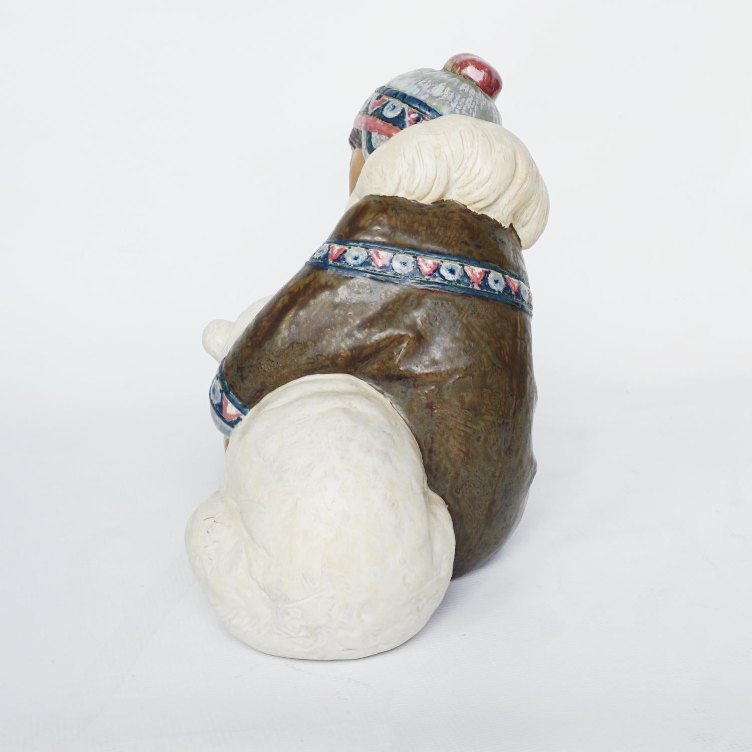 'Inuit Girl Playing' Pottery Figurine by Lladró 2