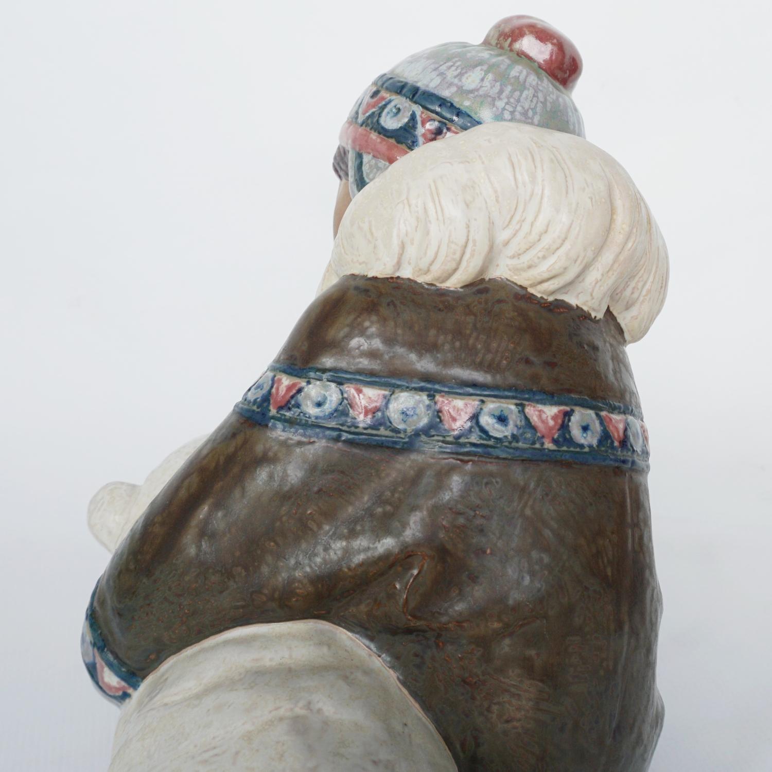 'Inuit Girl Playing' Pottery Figurine by Lladró 3