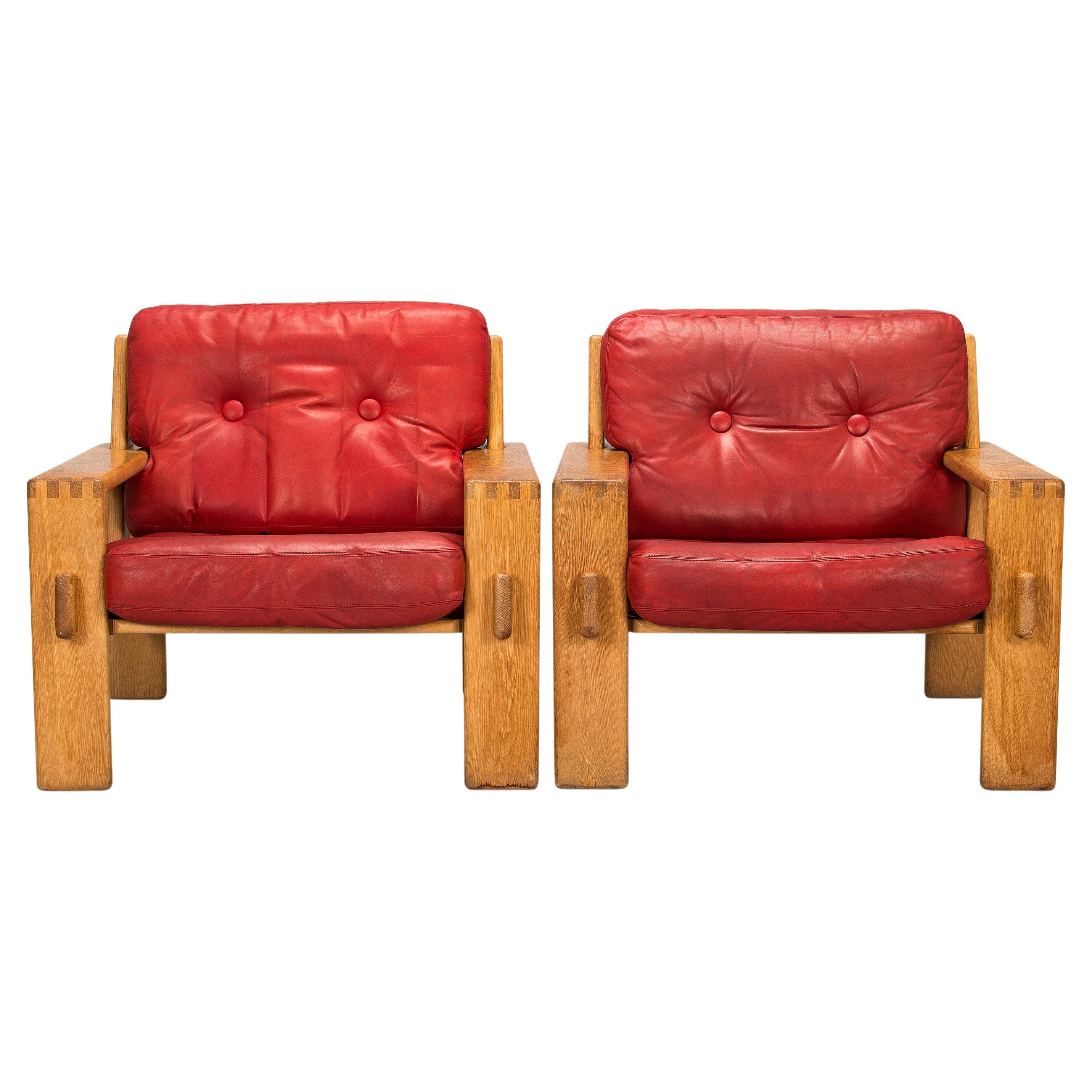 Esko Pajamies, A pair of 1970s 'Bonanza' armchairs for Asko, Finland.
Solid oak, frame original red leather upholstery. Measures: Width 80 cm. Height 74 cm, height to seat 39 cm.
Good condition wear due to age.
A pair available price for 1