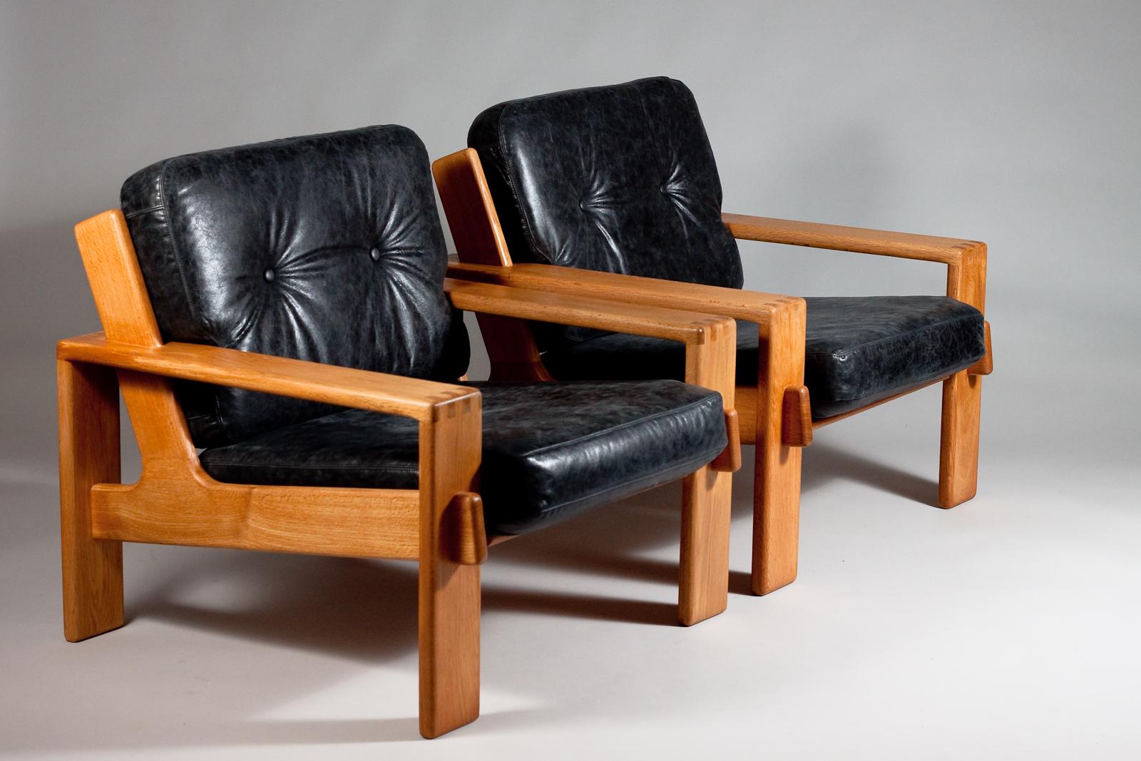 Leather Esko Pajamies, pair of 1960's Bonanza oak wood lounge chairs
