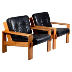 Esko Pajamies, pair of 1960's Bonanza oak wood lounge chairs