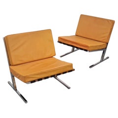 Esko Pajamies & Toivo Korhonen, Pair of Lounge Chairs in Leather and Steel 1960s