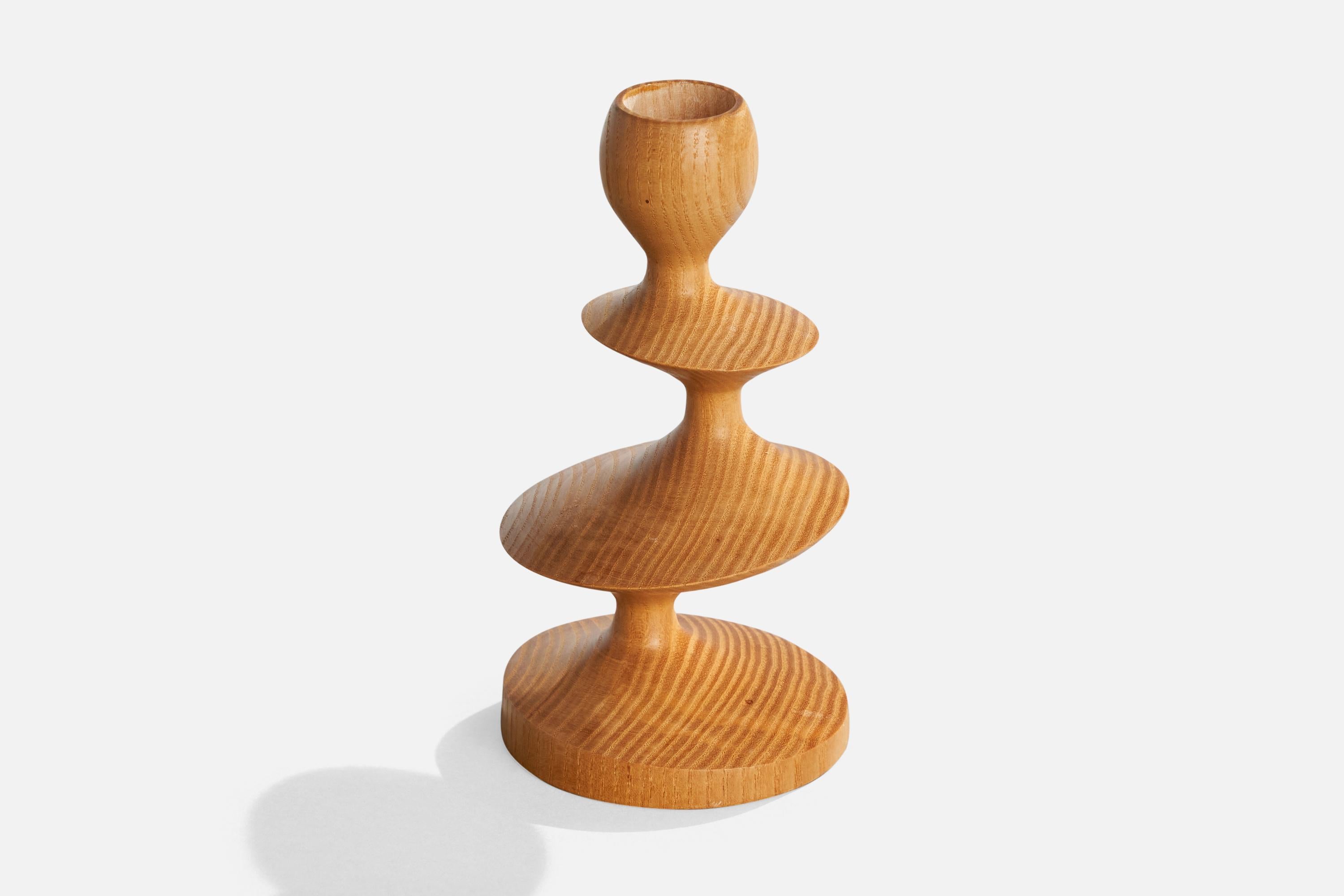A freeform candlestick designed and produced by Esko Yrjälä, Åby, Finland, c. 1970s.

Dimensions: 5.625” H x 2.9” W x 2.9” D

Holds one .875” Diameter candles