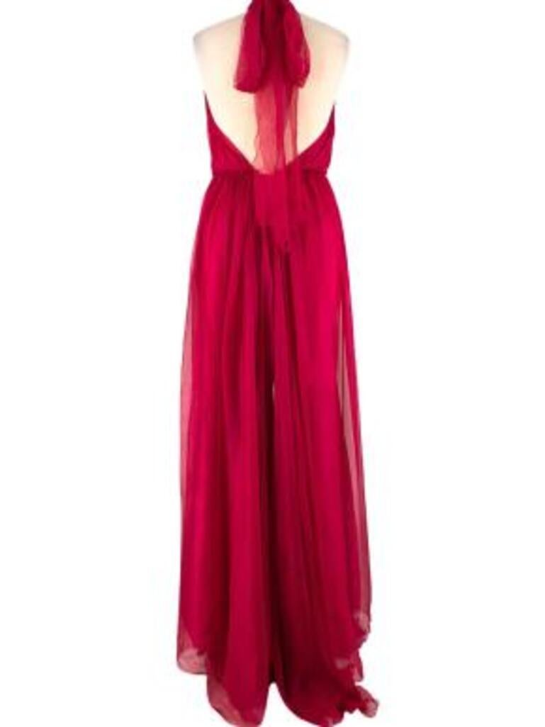 Maria Lucia Hohan Eslem Pleated Hot Fuscia Silk Evening Gown
 

 - Fluid silk, sheer body 
 - Pleated, layered 
 - High neck with tie fastening 
 - Backless
 - Floor length
 - Part lined
 

 Materials:
 Shell:
 100% Silk 
 Other:
 92% Nylon 
 8%