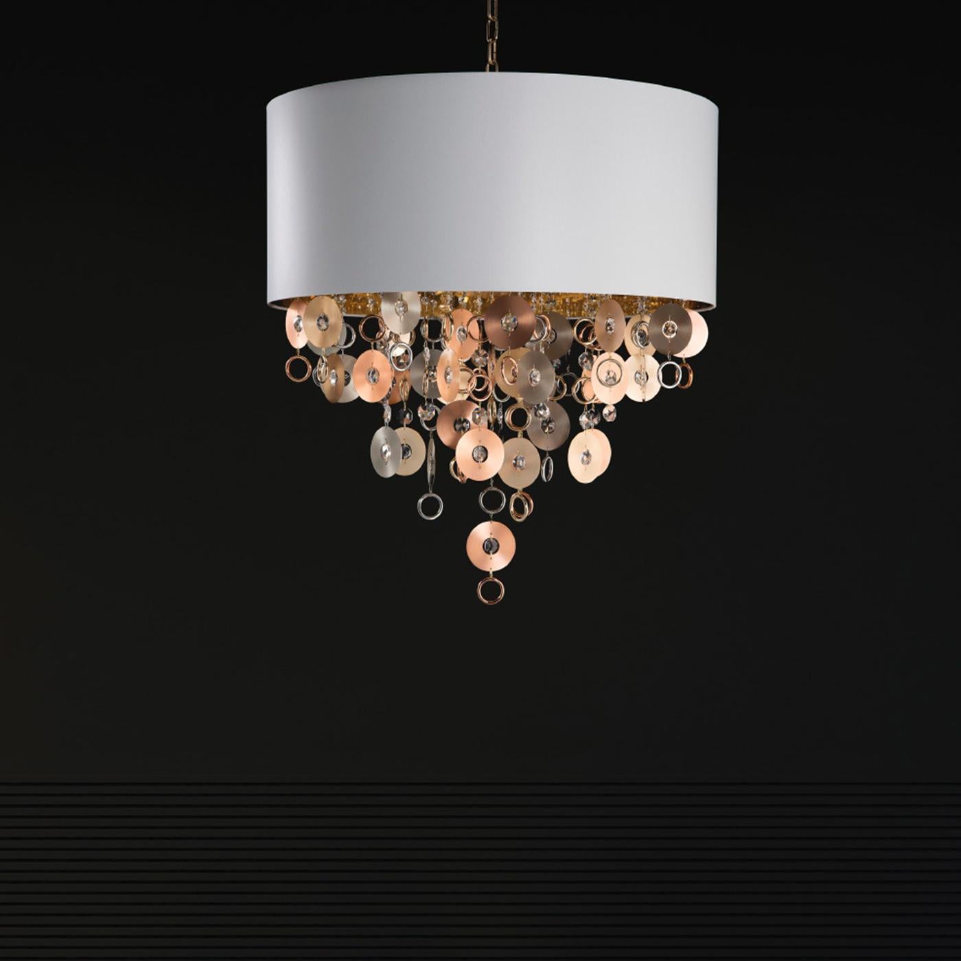 This sophisticated pendant lamp from the Esmeralda Collection will bring an accent of shimmering elegance to any interior with its royal-cut clear crystal beads enclosed in satin gold-finished metal disks dangling from its center in a pyramid of