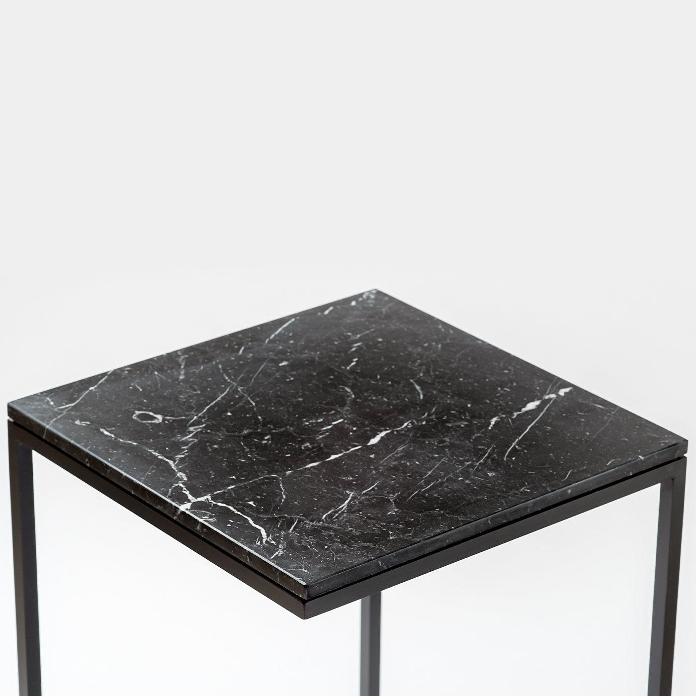 Part of an exquisite series of side tables and coffee tables named after Greek fabulist Aesop and designed by artist Antonio Saporito, this side table can be combined to other pieces with the same design yet different heights or finishes for a