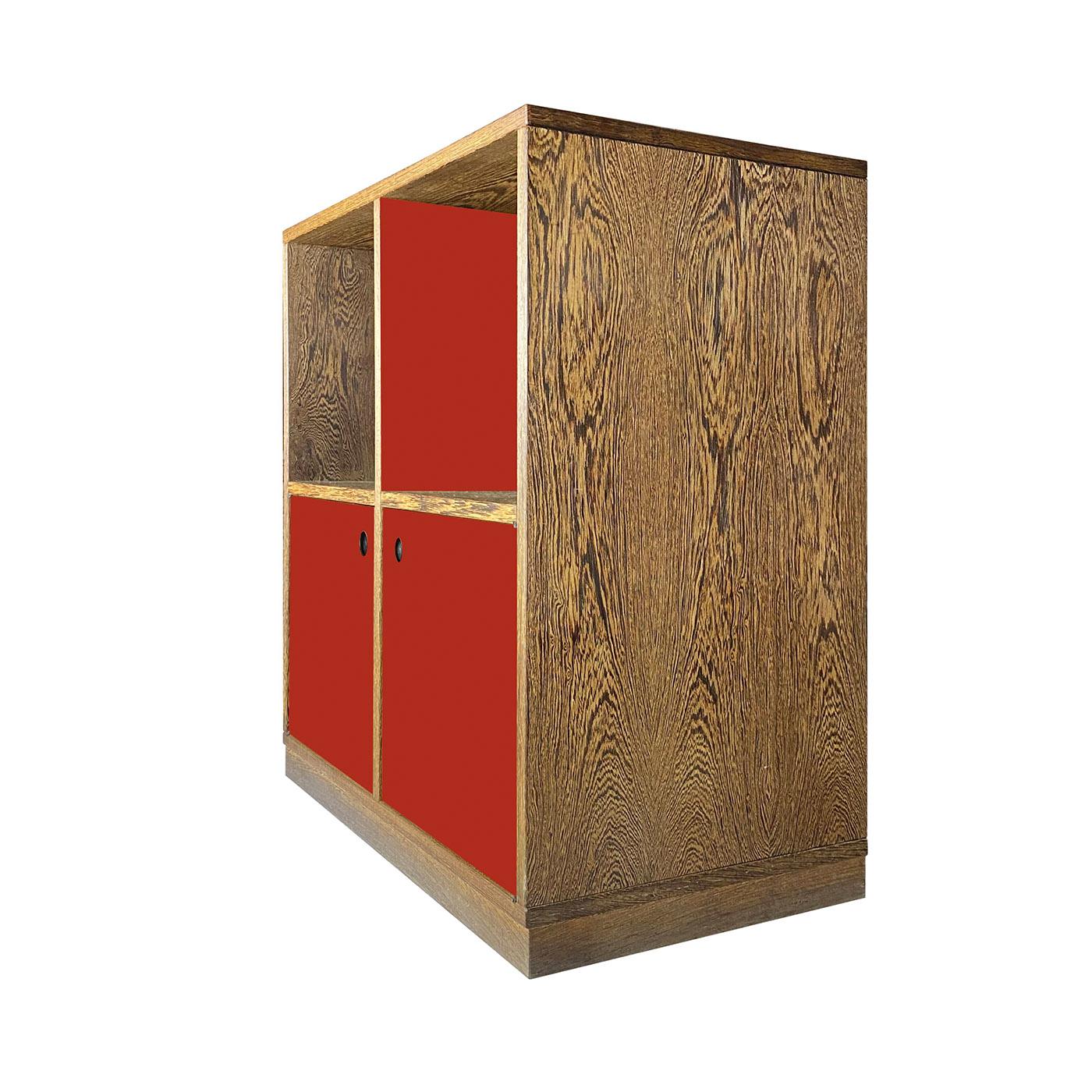 Originally designed in the 1970s, this sideboard is a contemporary take on a vintage classic. Revisited in 2014 by Ferdinando Meccani, it is handmade of wengé wood lacquered with red paint on the two bottom doors.