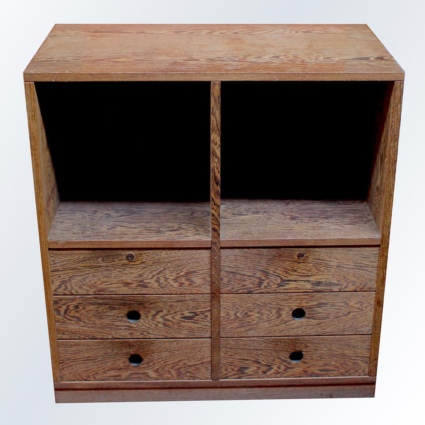 Stately and elegant, this cabinet will add rustic-chic flair to any interior, where it can provide a functional space to store tableware and linens in a dining room, or media accessories, books, and decorative objects in a living room. The solid