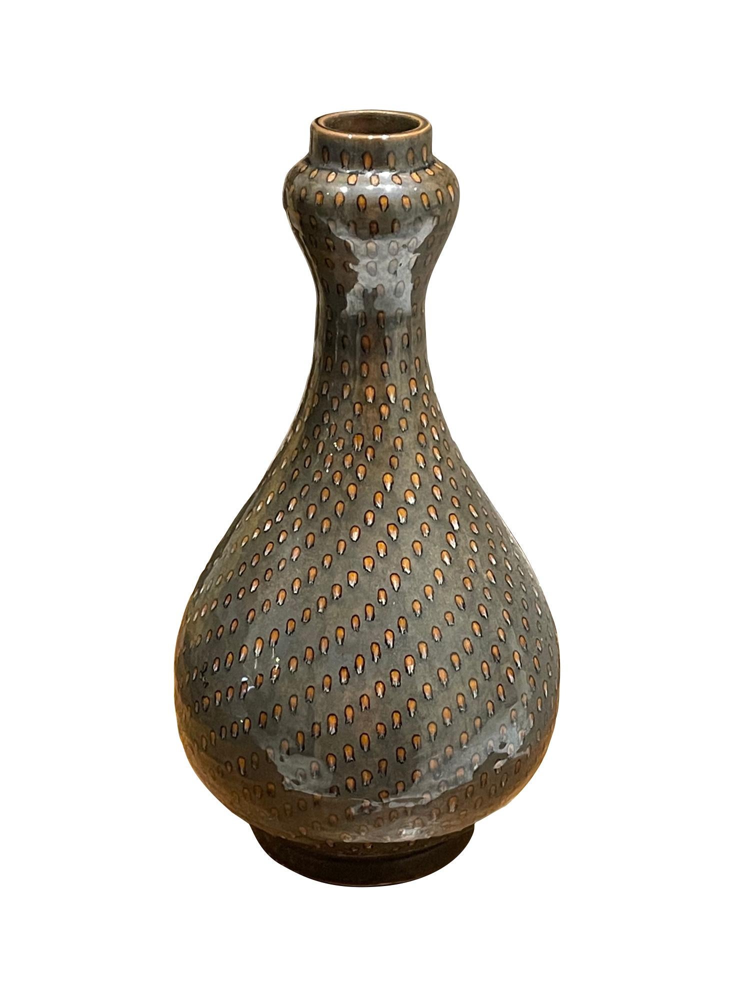 Contemporary Chinese handmade pin dotted vase.
Dark grey color ground with cream dots all applied using fine quill paint brush.



