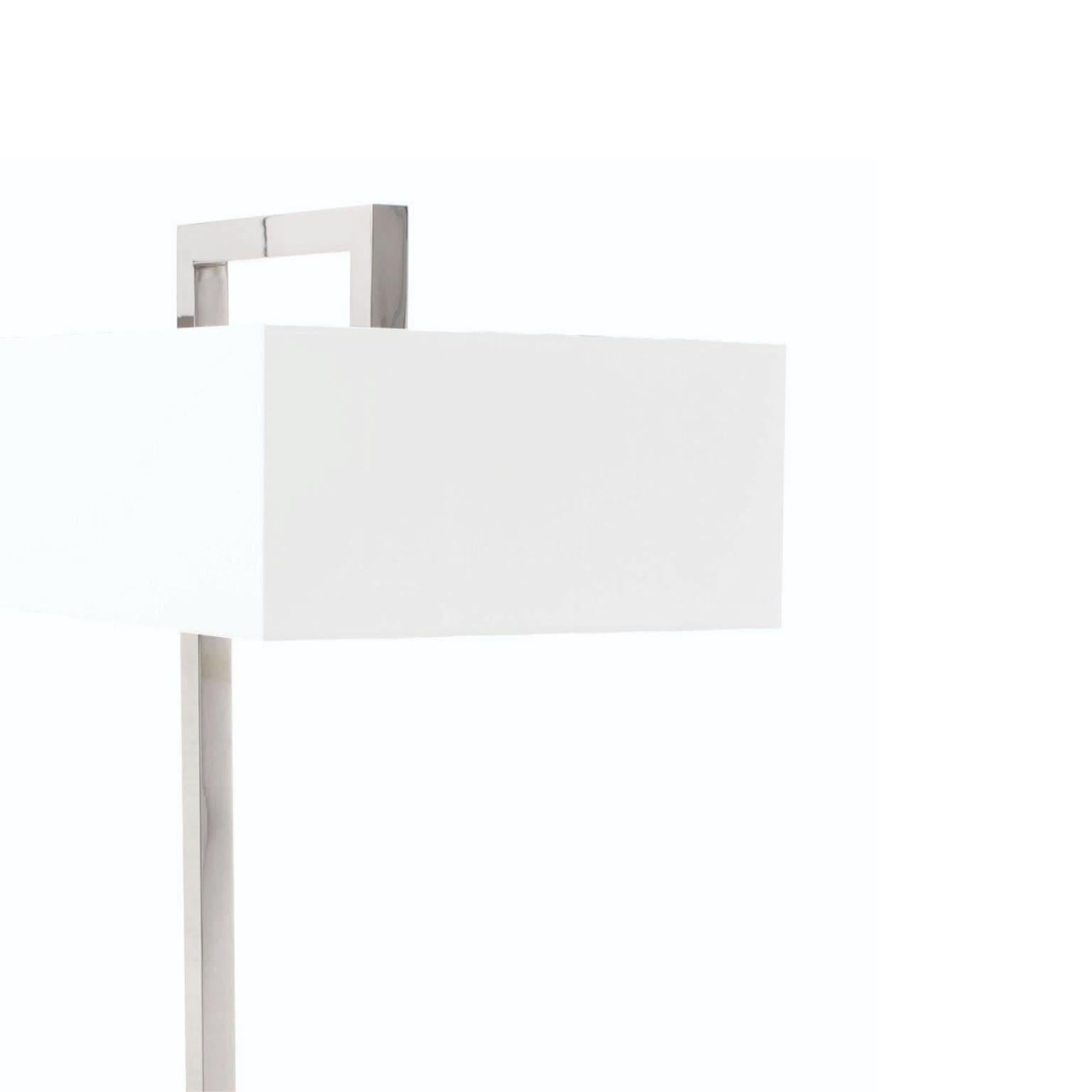 Minimalist Espresso Silk Floor Lamp by Caffe Latte

This Minimalist Espresso Silk Floor Lamp by Caffe Latte has an extremely minimal structure made of stainless steel and a white silk matching square shade. The wide shade is sized to balance its