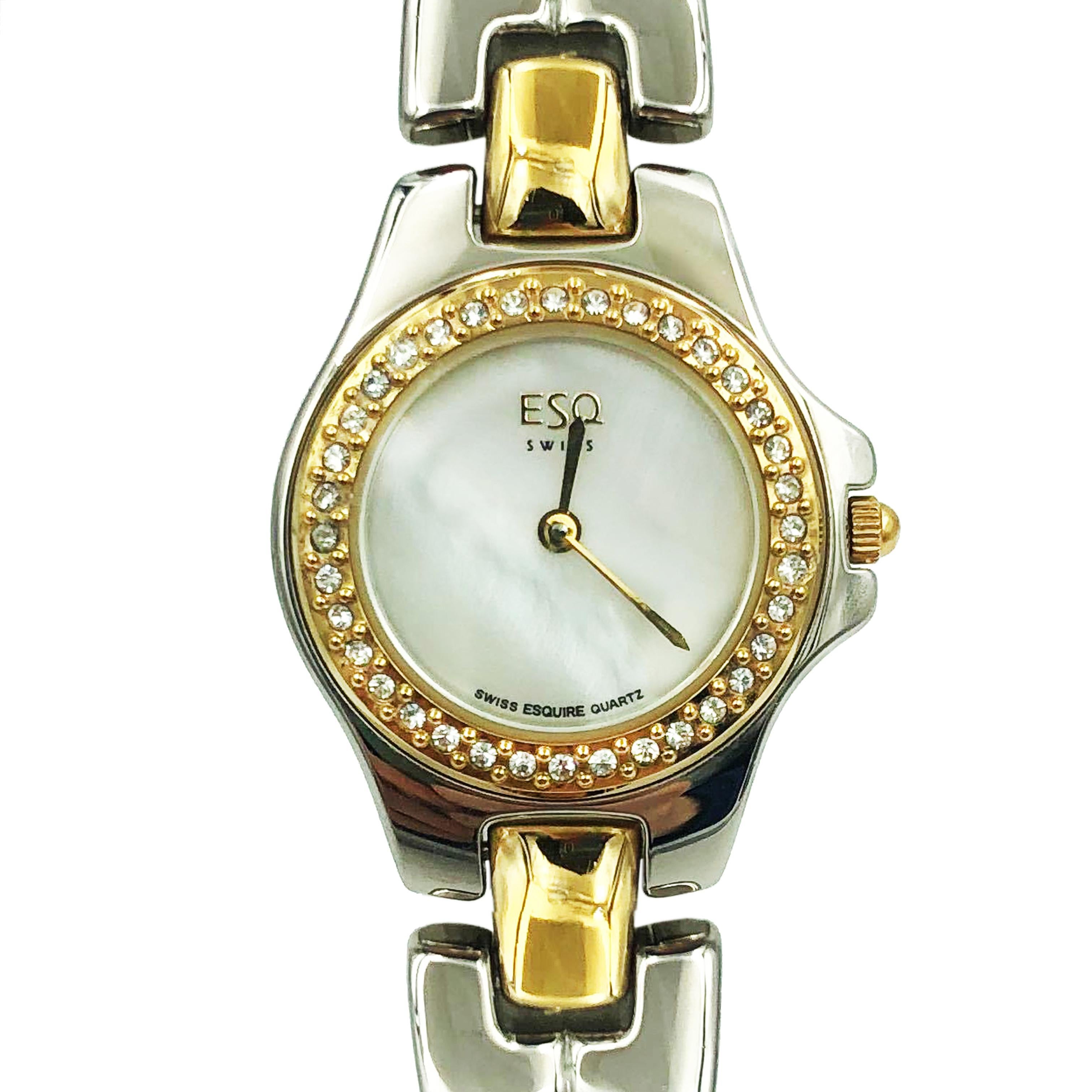 Pre owned ESQ Movado Contessa Two Tone Steel MOP Dial Quartz Ladies Watch 07100506. The Watch Has Scratches and Might Have Little Dents. Original Box and Papers are NOT Included. Comes With Chronostore Presentation Box and Chronostore Authenticity