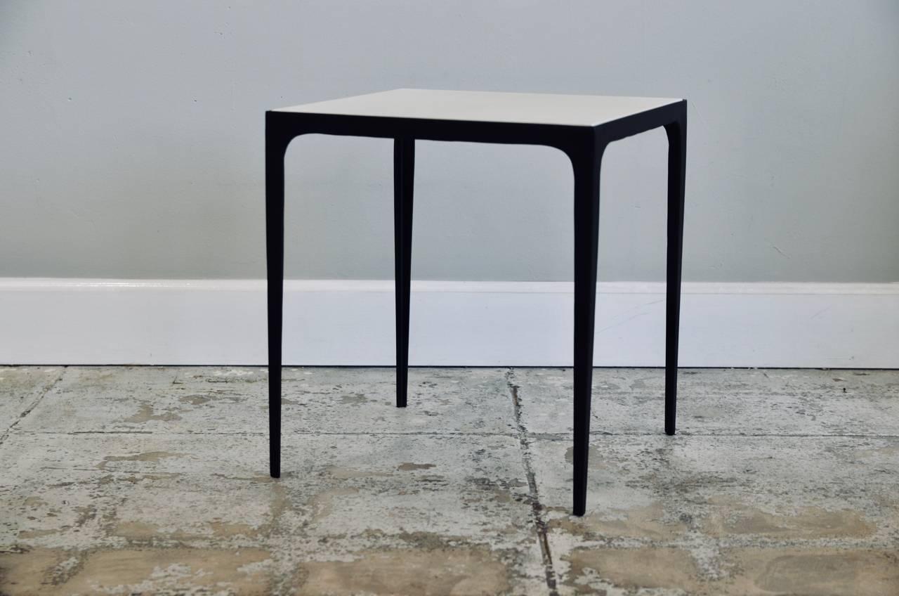 'Esquisse' parchment and wrought iron side table by DESIGN FRÈRES.

Hard to find real parchment top. Chic and understated.