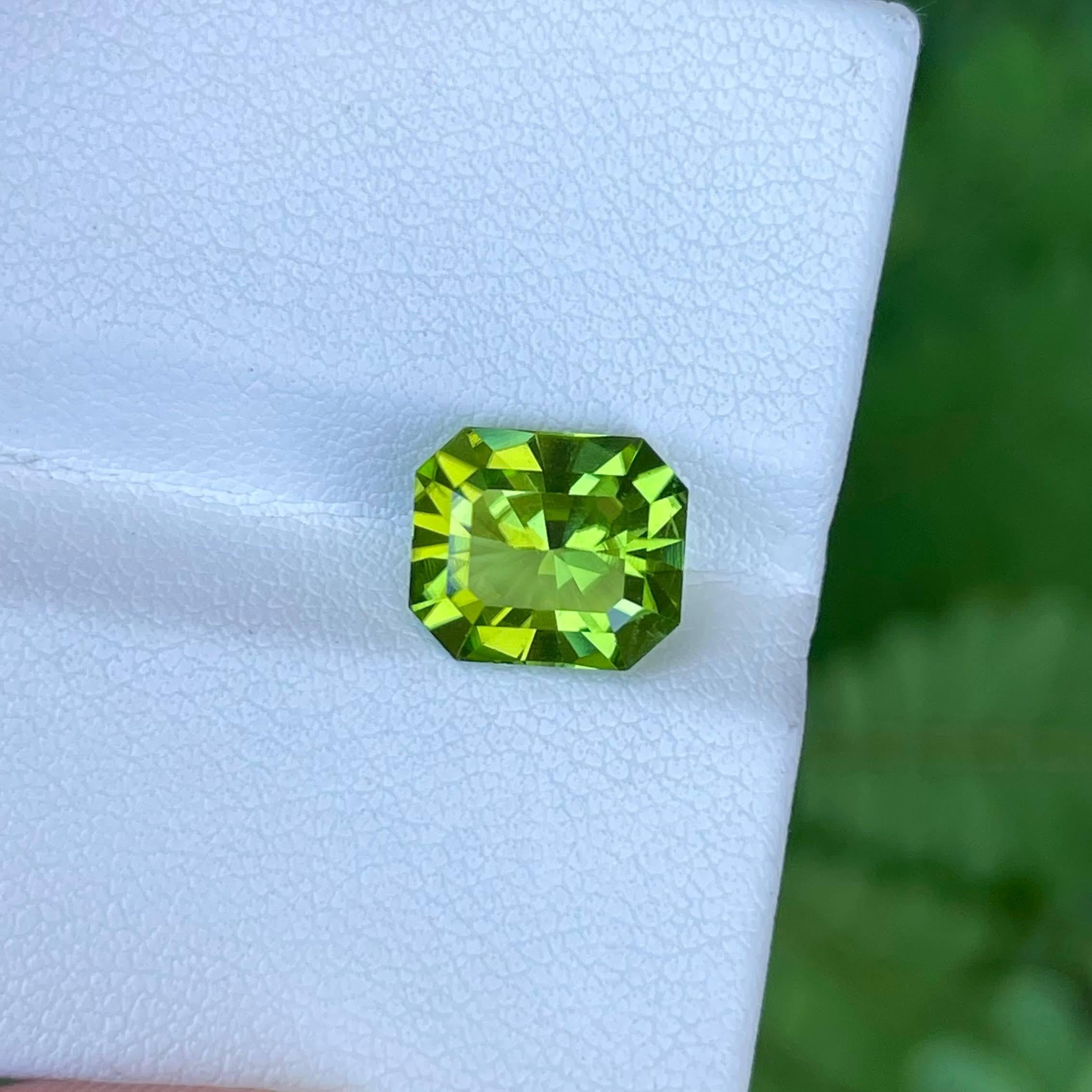 Weight : 3.35 carats 
Dimensions: 9.4x8.1x5.5 mm
Clarity: Eye Clean
Origin: Pakistan
Treatment: None
Shape: Octagonal
Cut: Radiant Cut




The Apple Green Peridot Stone, a radiant embodiment of elegance and sophistication, weighs a substantial 3.35