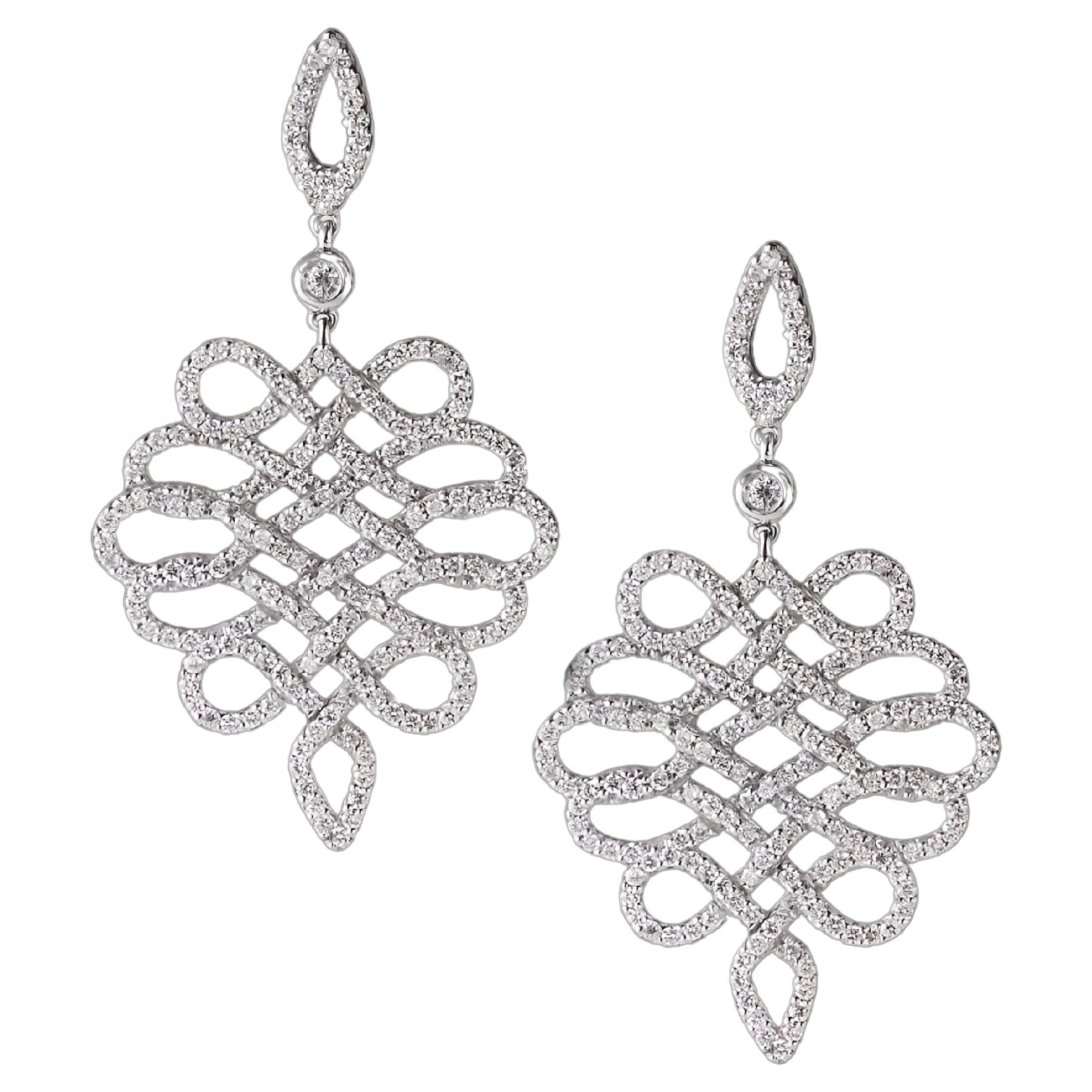 Essence of Flow: 18kt Gold Earrings with Natural White Diamonds For Sale