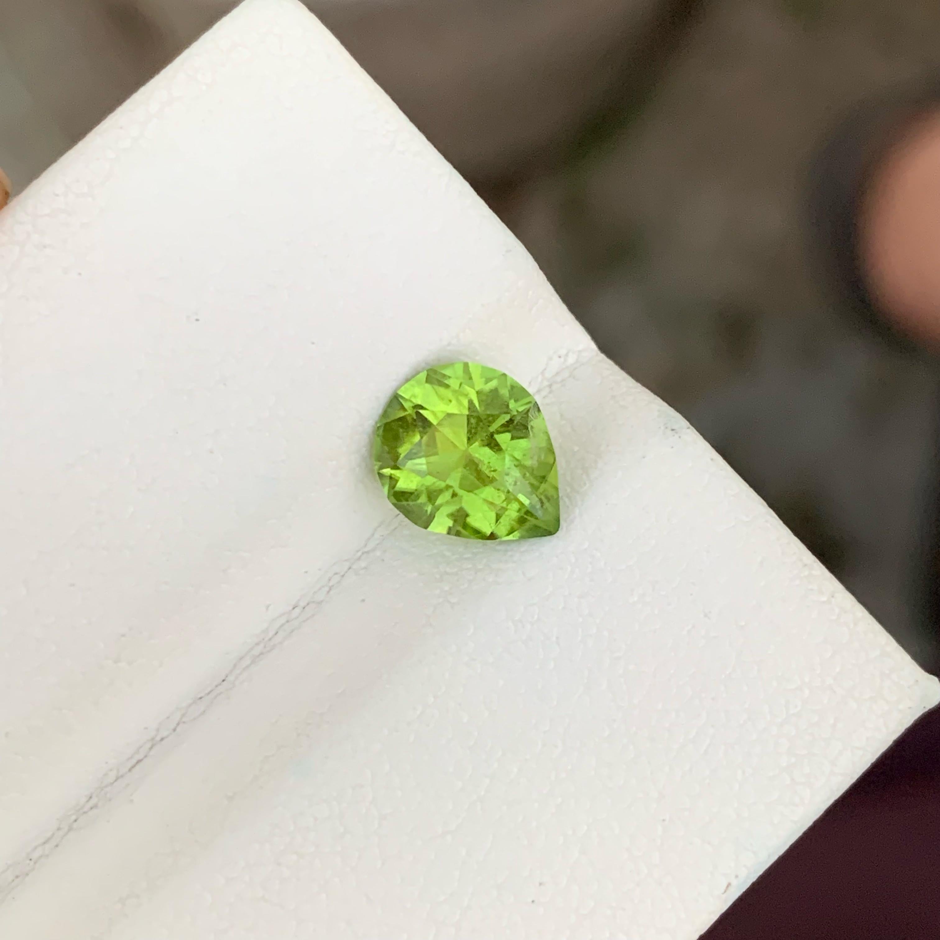 Modern Essence of Green Peridot 1.70 carats Pear Cut Natural Loose Pakistani Gemstone For Sale