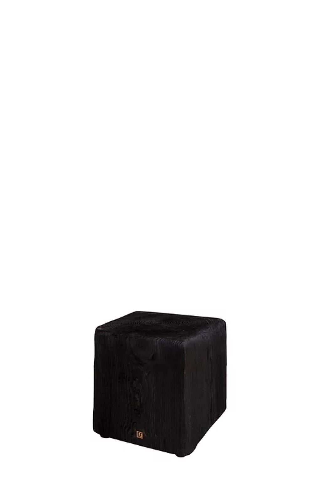 Essence S by Rectangle Studio
Dimensions: 25x25x25 cm
Materials: Solid Pine, Natural Black Wood oil 

Kabuk is an alternative product with sculptural appearance which can be used as a coffee table and a bedside table with its modern