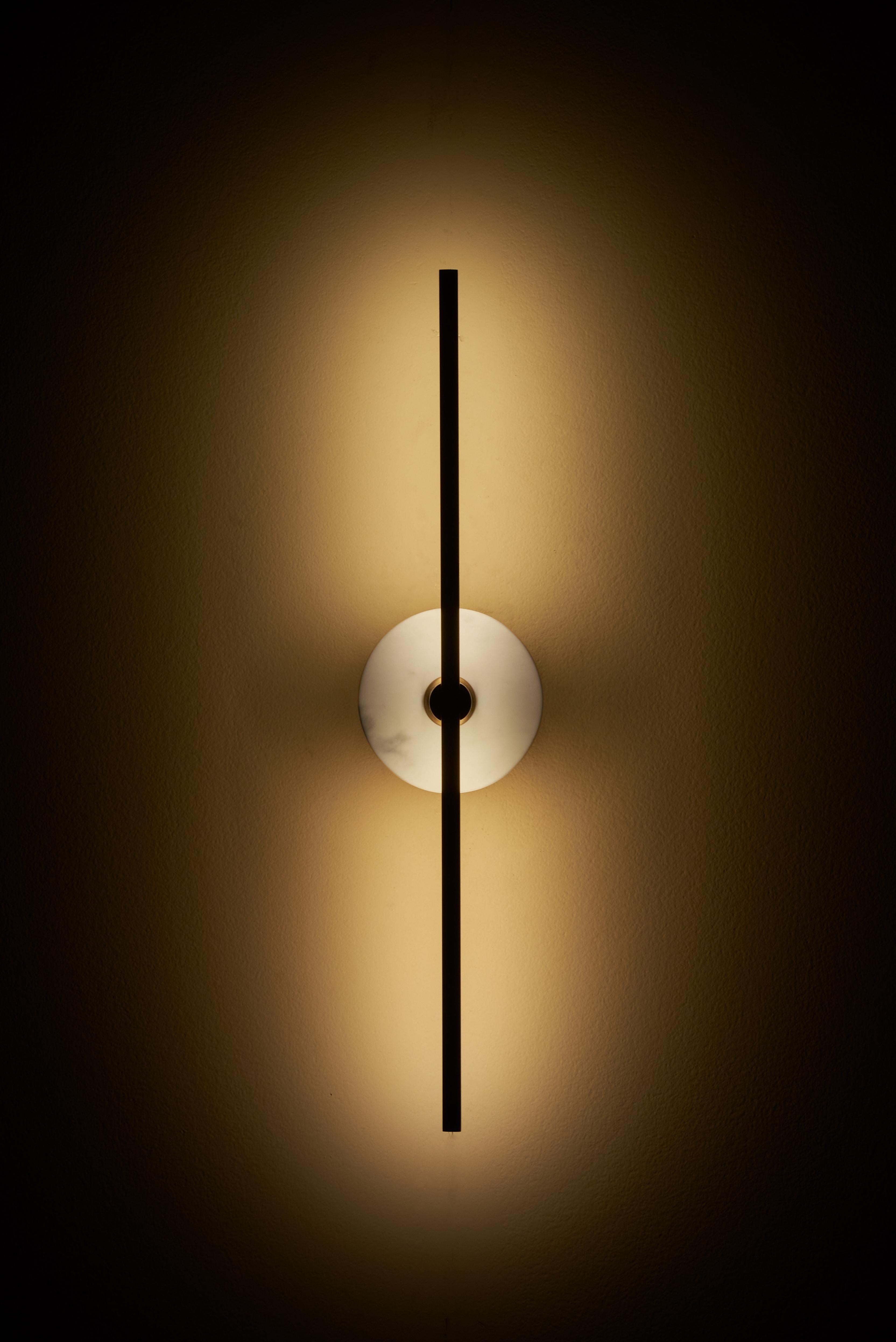 The Stick wall sconce combines the minimalism of thin brass profiles with the functionality and power of led technology.
The use of thin brass profiles creates a minimalist look that is both elegant and functional, while the incorporation of LED