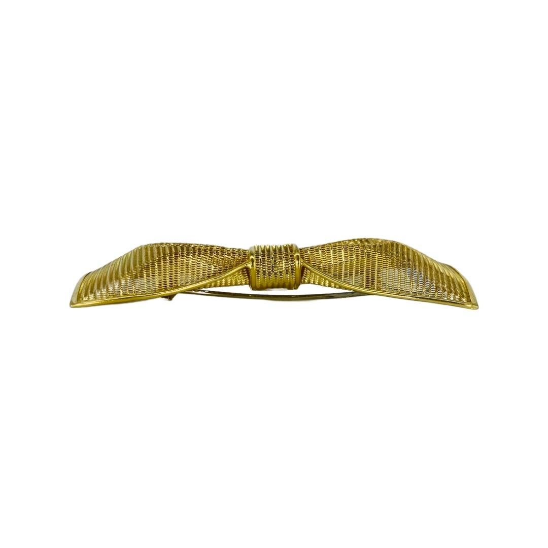 Essepi Bow Tie 18 Karat Gold Pin Brooch.
Essepi by Eugenio Pavan of Vicenza, Italy 
Rare piece perfectly made to impress truly makes a strong statement and is a stand out in the crown brooch/pin. The bow tie measures 2.7 Inch X 1.3 Inch and weights