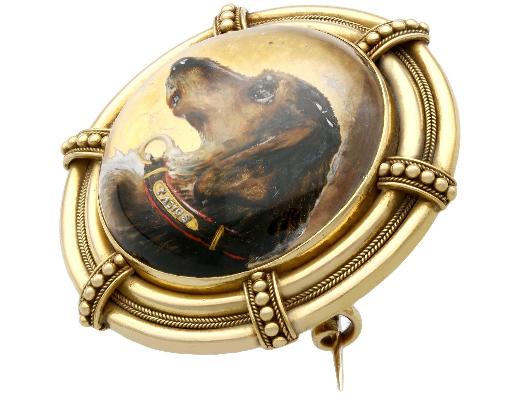 A stunning, fine and impressive antique Essex crystal and 18 karat yellow gold dog brooch; part of our antique estate jewelry collections.

This stunning, fine and impressive Essex crystal Victorian brooch has been crafted in 18k yellow gold.

The