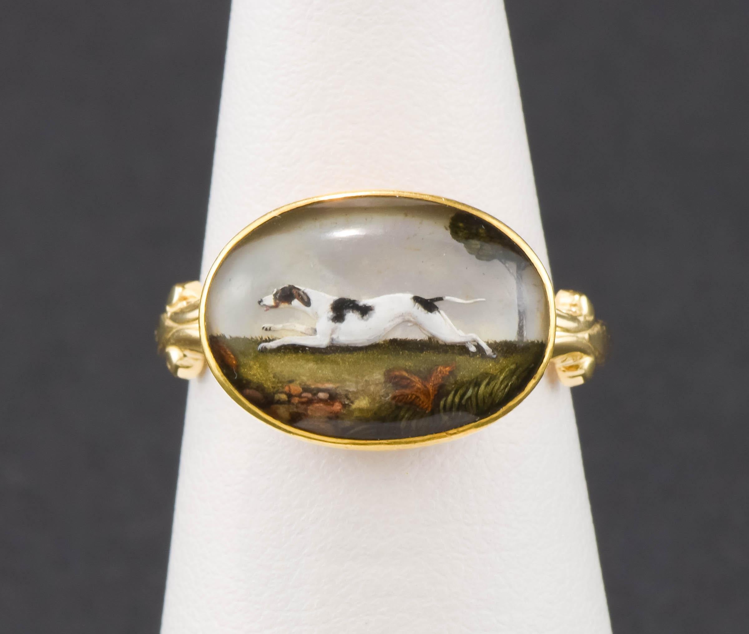 Originally part of a pair of fine Victorian 18K gold European cufflinks, this sweet running hound dog 'Essex Crystal' has been converted into a charming ring.  His brother has also been converted and will be available shortly in a separate listing