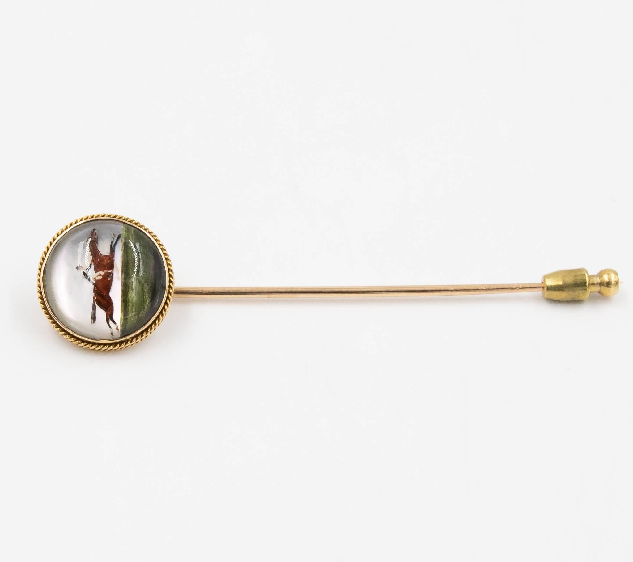 This Horse & Jockey themed Essex Crystal stick pin is a classic design.  This antique pin would be great for a fun night out to the horse race track or just a great unique piece to wear representing the quality jewelry made from years ago.  Please