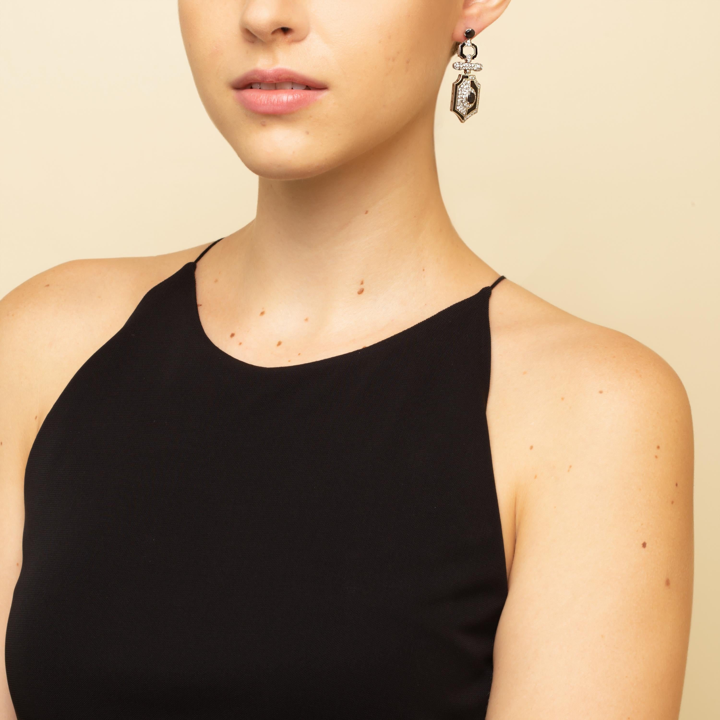 “Art Deco Style Yin Yang“ 

2.50 carats of diamonds, and 2 Black Onyx cabochons, set in 18kt Gold with Black Enamel. Push Backs.

*Free Shipping Worldwide