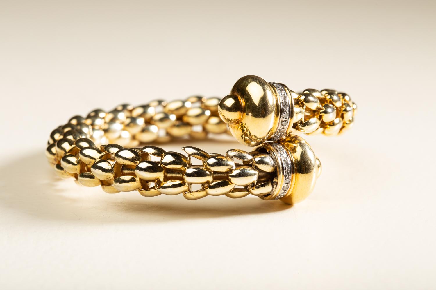 Contemporary Dome Bracelet in 18 Karat Yellow and White Gold Set with Diamonds For Sale