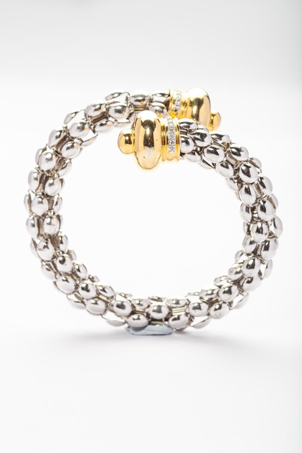Contemporary Dome Wrap Bracelet in 18 Karat White and Yellow Gold Set with Diamonds For Sale