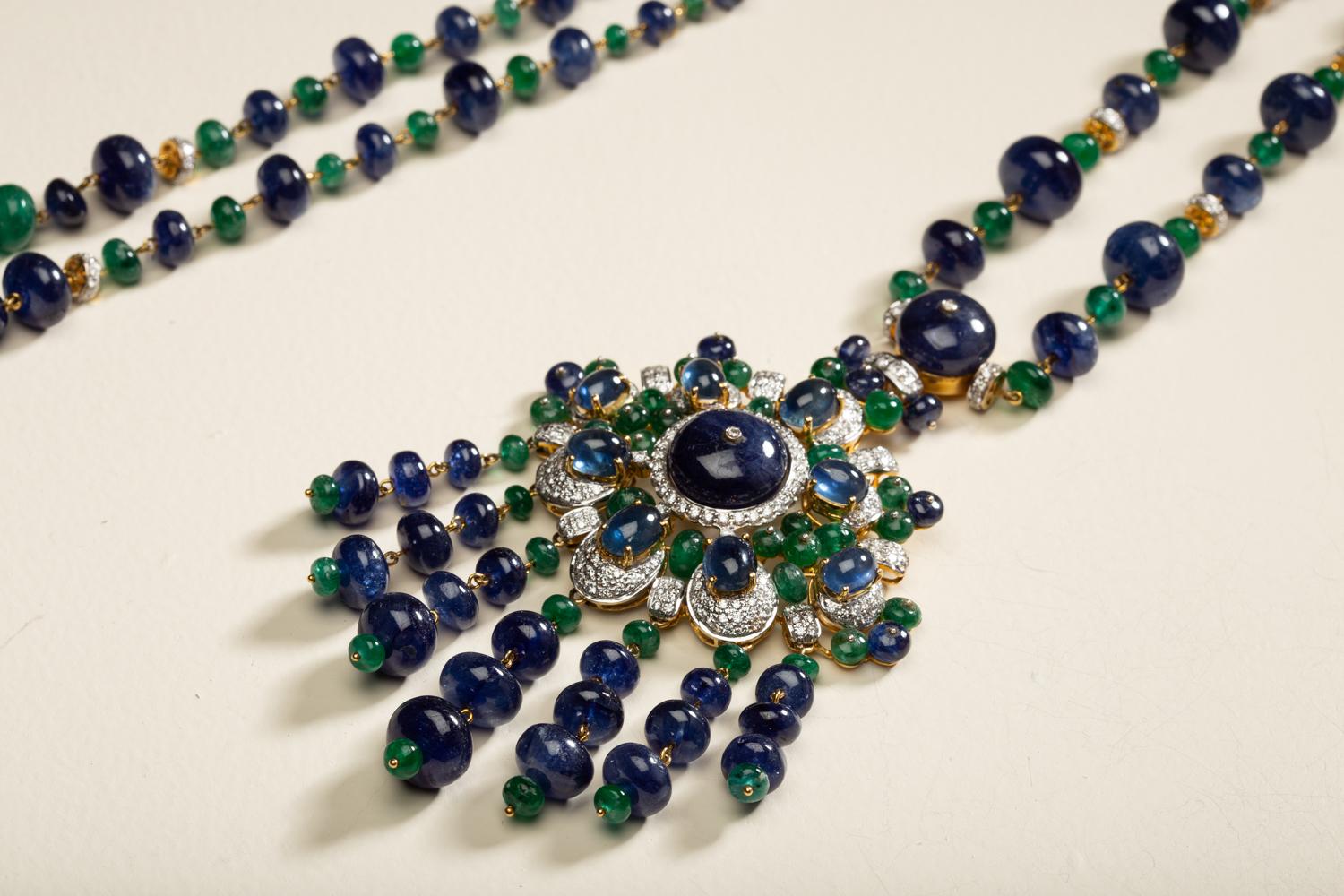 “The Peacock Necklace“ 

7.78 carats of diamonds, 97.61 carats of Emeralds, and 548.89 carats of Blue Sapphires set in 18kt Gold. 

*Free Shipping Worldwide
