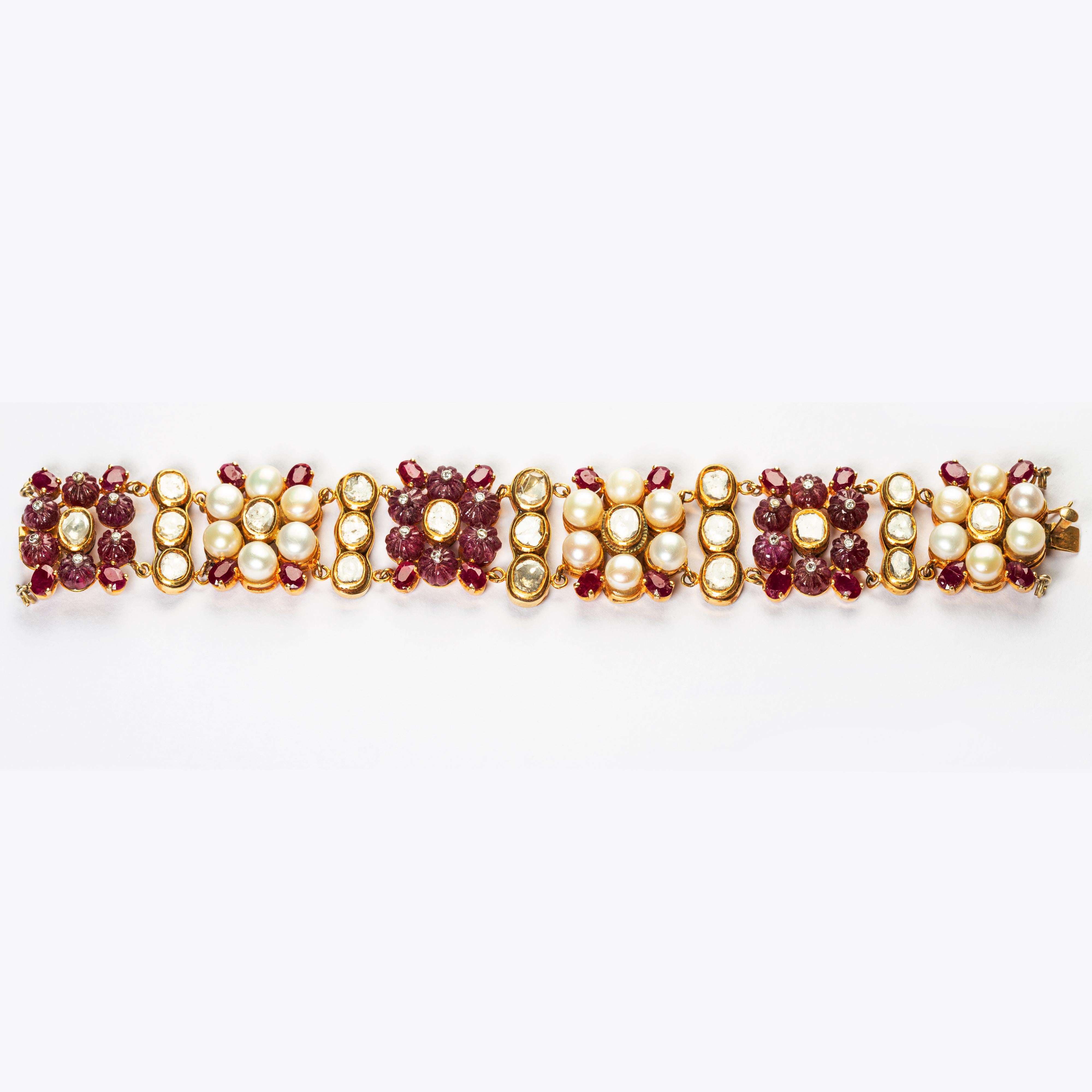 “Shahi Lal Dera Bracelet“ 

Inspired by the 17th century Royal Red Tent commissioned by the Mogul Emperor Shahjahan, the builder of the Taj Mahal, to be used while traveling. 

22kt gold handcrafted Bracelet with 0.29 carats of Diamonds, 15.08gm