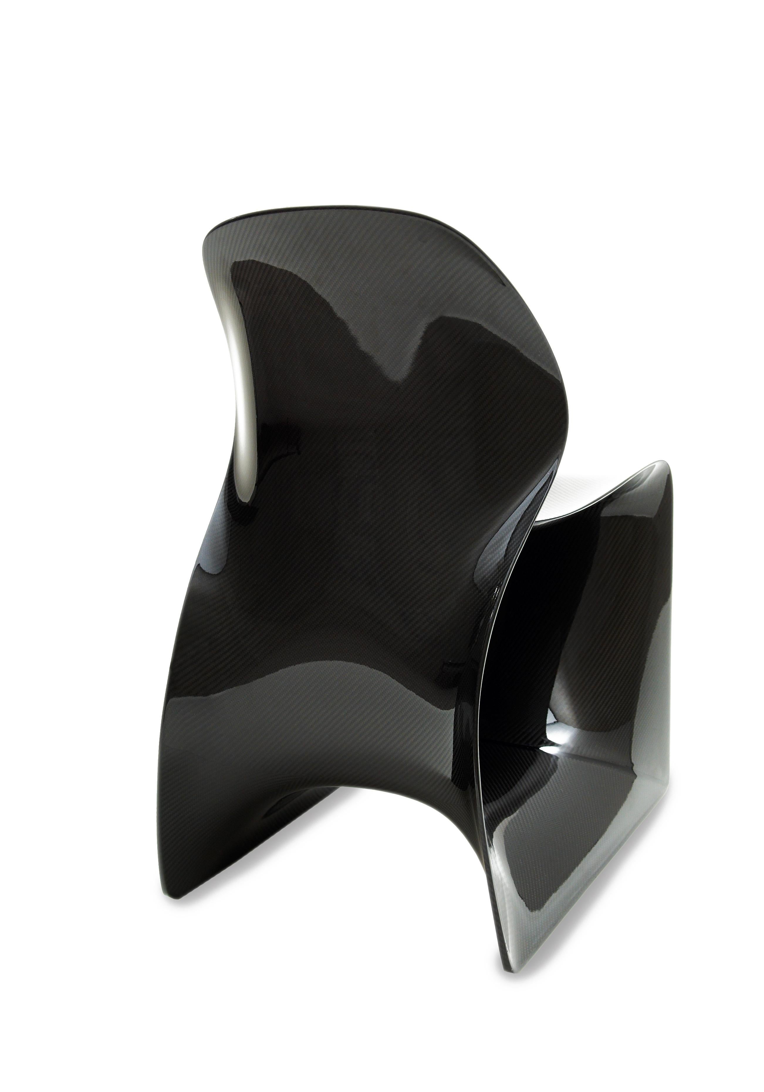 The organic curves and gravity-defying cantilever of the Moot chair are a result of Ross Lovegrove’s continuing fascination with carbon fibre; a light, high-strength material used by aircraft and racing engineers. The complex curvature could not be