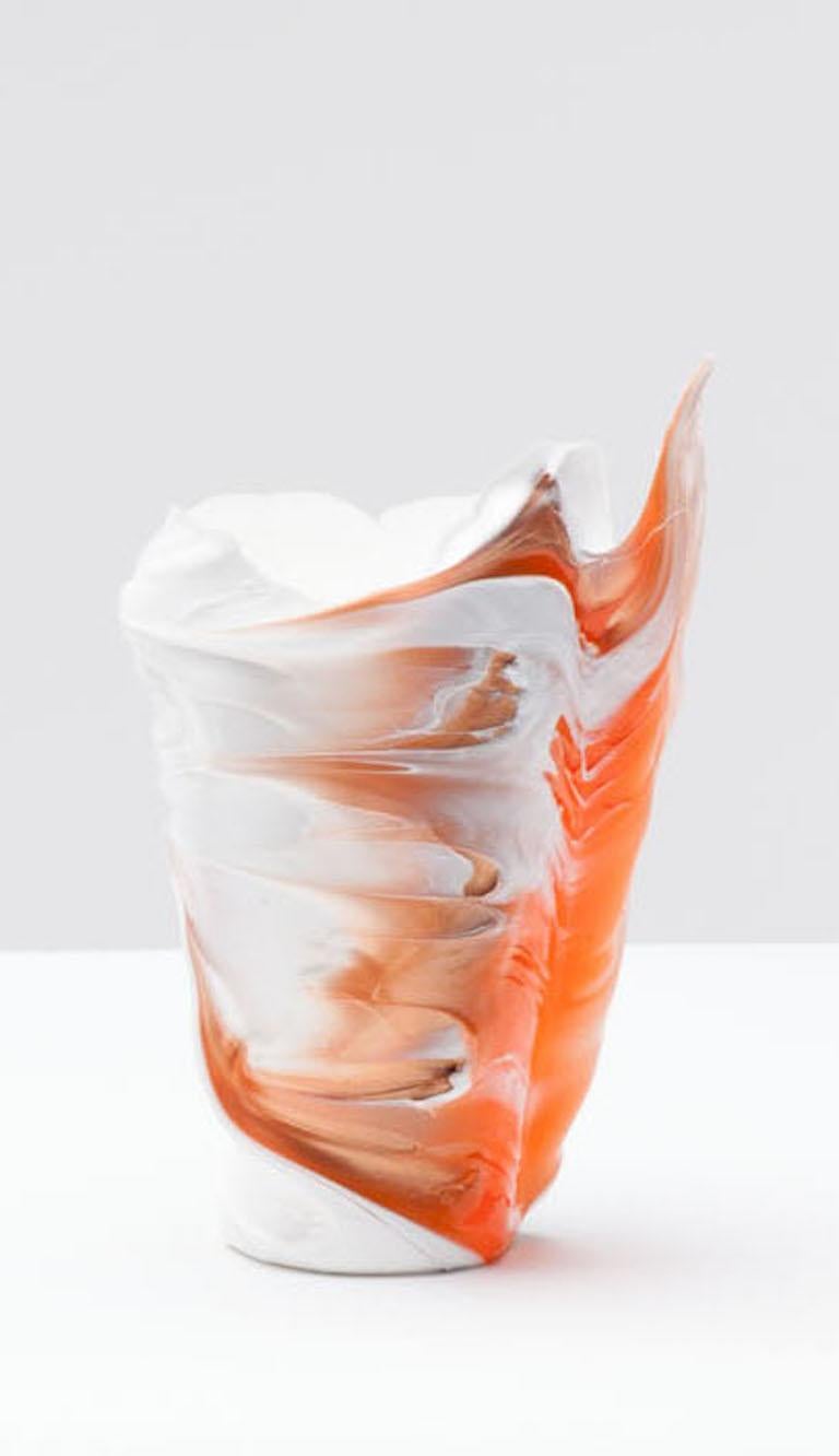 This playful vase truly utilizes the material properties of silicone capturing fluidity and motion. The direct touch of the designer is shown in the unique result achieved every time in this artistic object and functional vase.