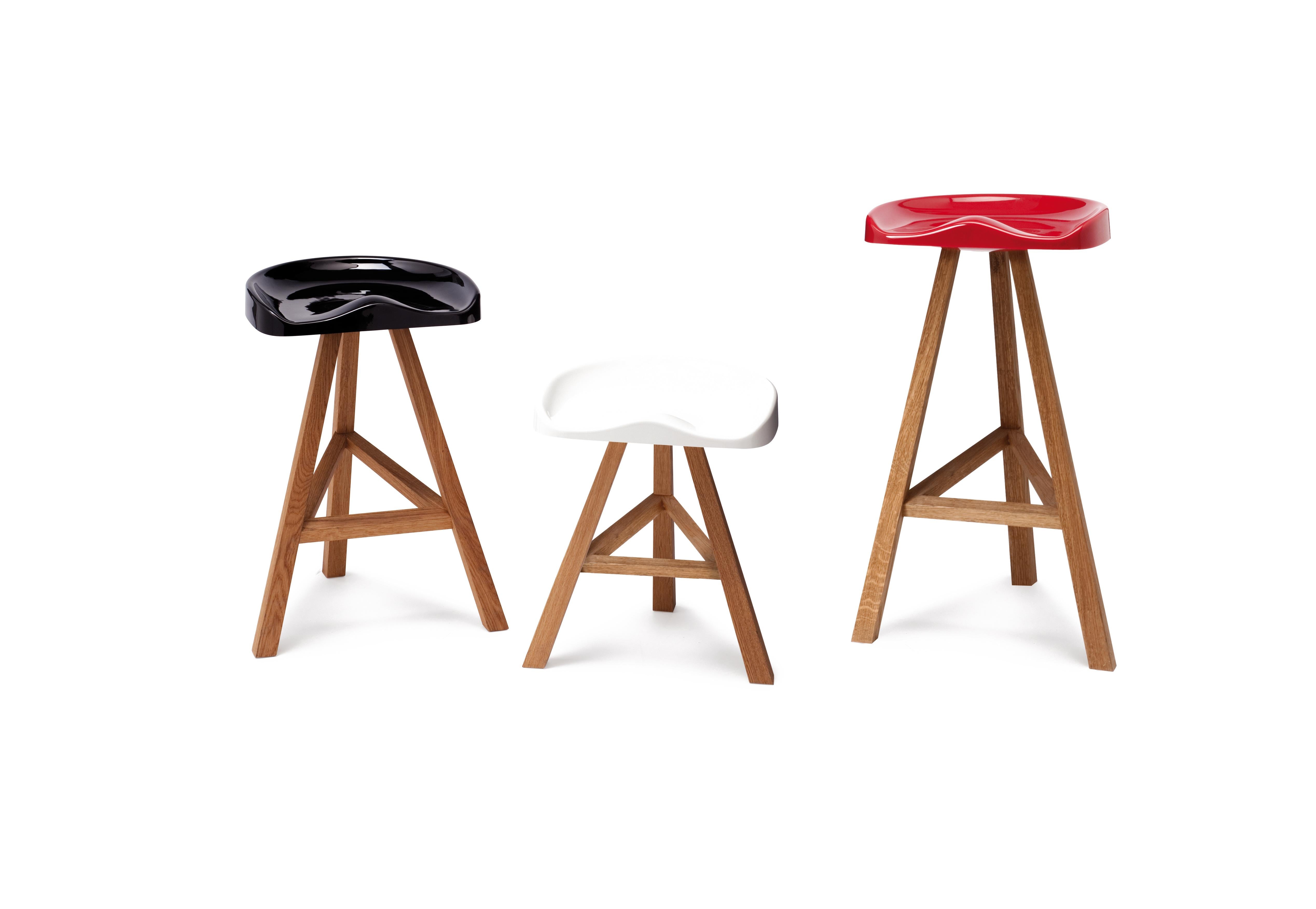 The Heidi is a fun stool that takes its inspiration from the Classic tractor seat and the rustic, three-legged, timber milking stool. Part modern statement, part nostalgia, the solid, colorful molded seat is combined with a sturdy, geometric,