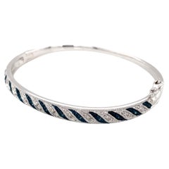 Estate 0.10 carat (Ctw) Blue and White Diamond Sterling Silver Bangle Bracelet