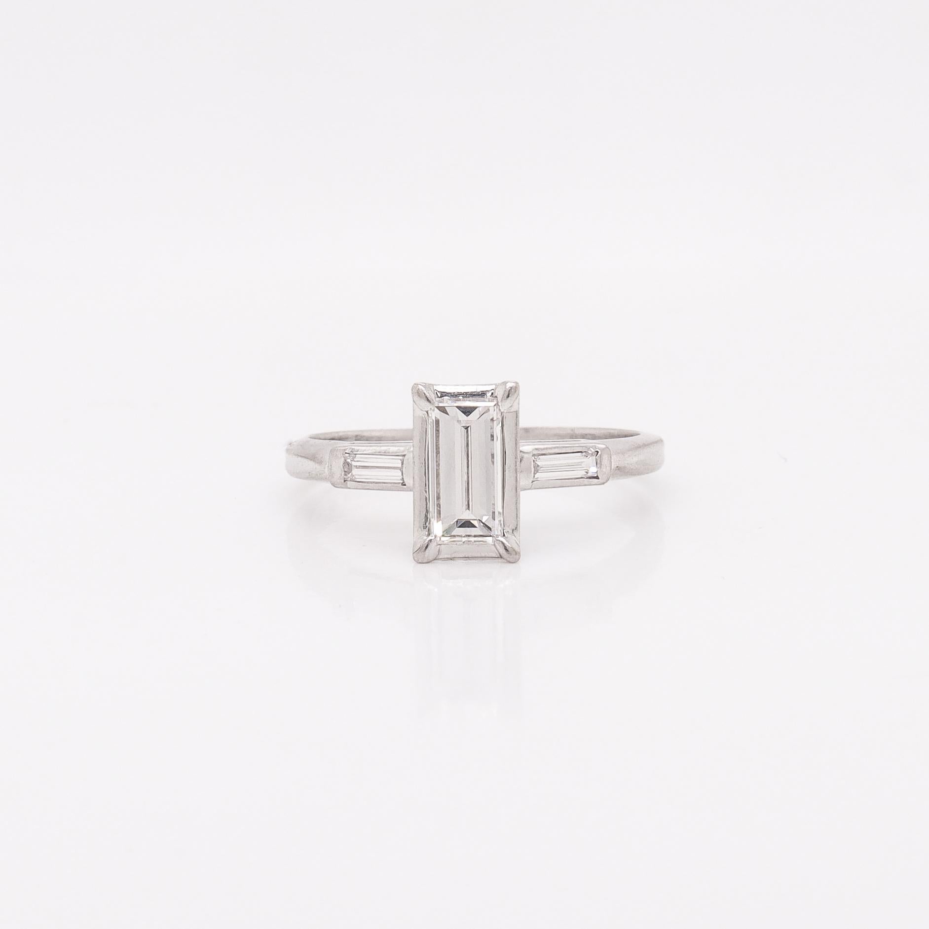Estate 0.60 Ctw Baguette Diamond & Platinum Three-Stone Ring In Good Condition For Sale In Philadelphia, PA