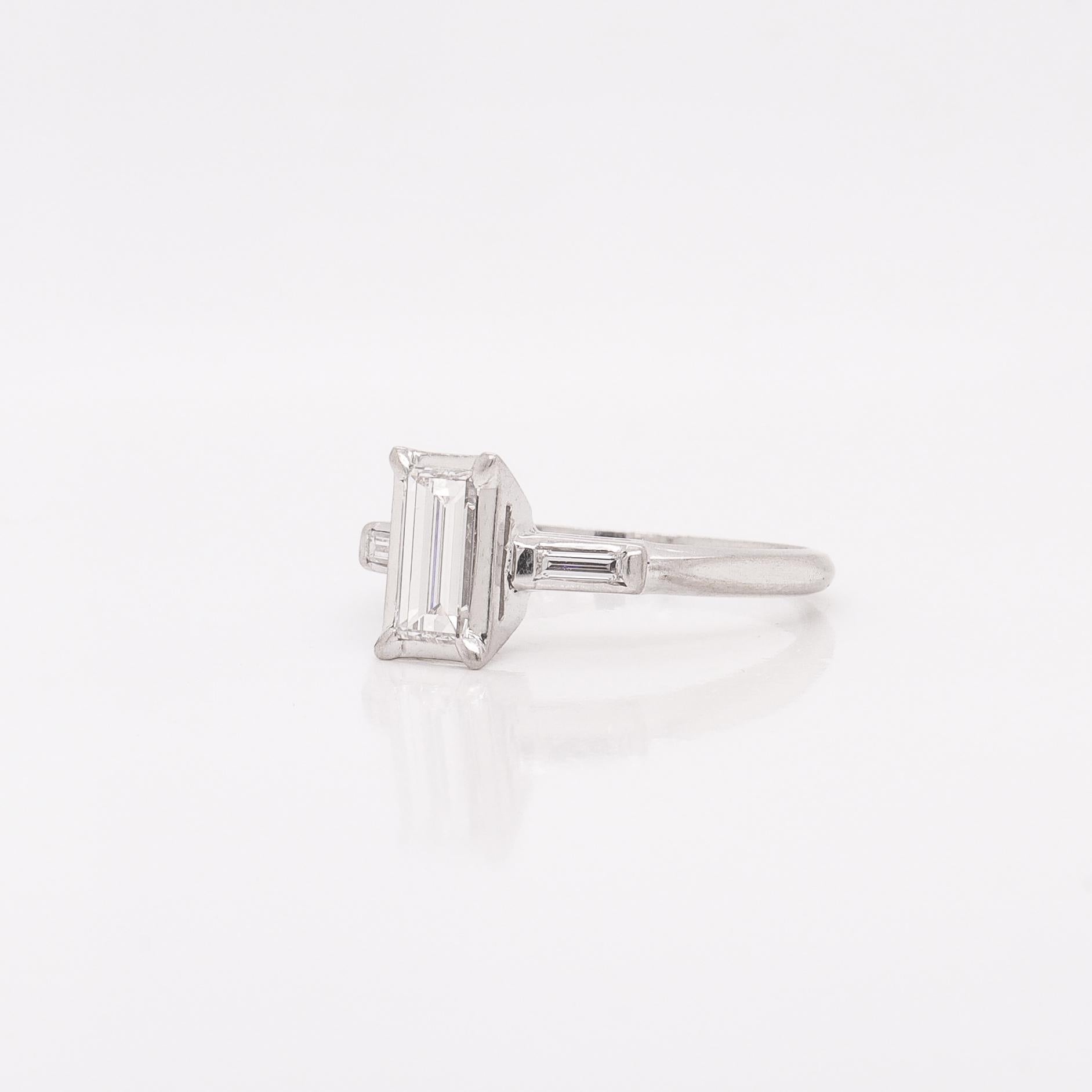 Women's or Men's Estate 0.60 Ctw Baguette Diamond & Platinum Three-Stone Ring For Sale