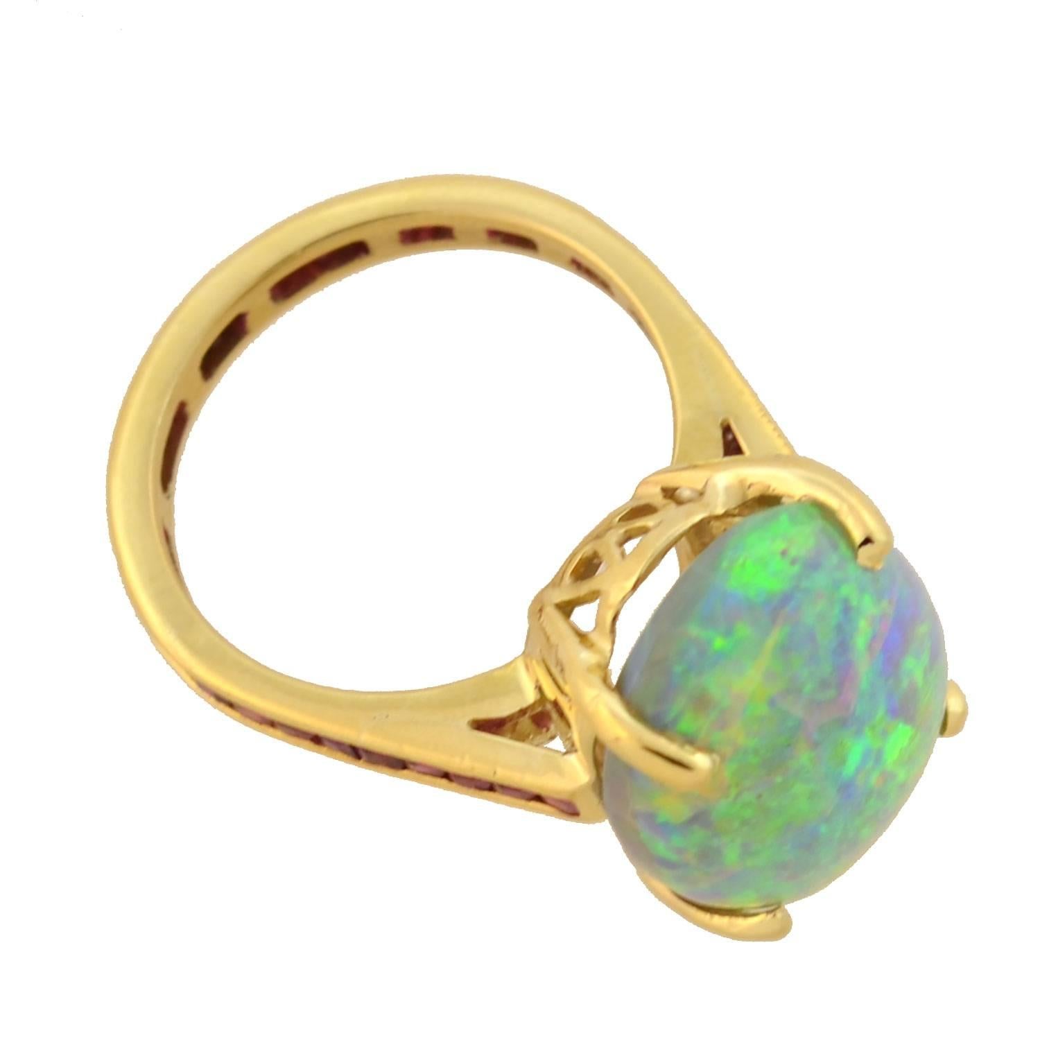 Contemporary Estate 10.00 Carat Opal Ring with Calibrated Ruby Band