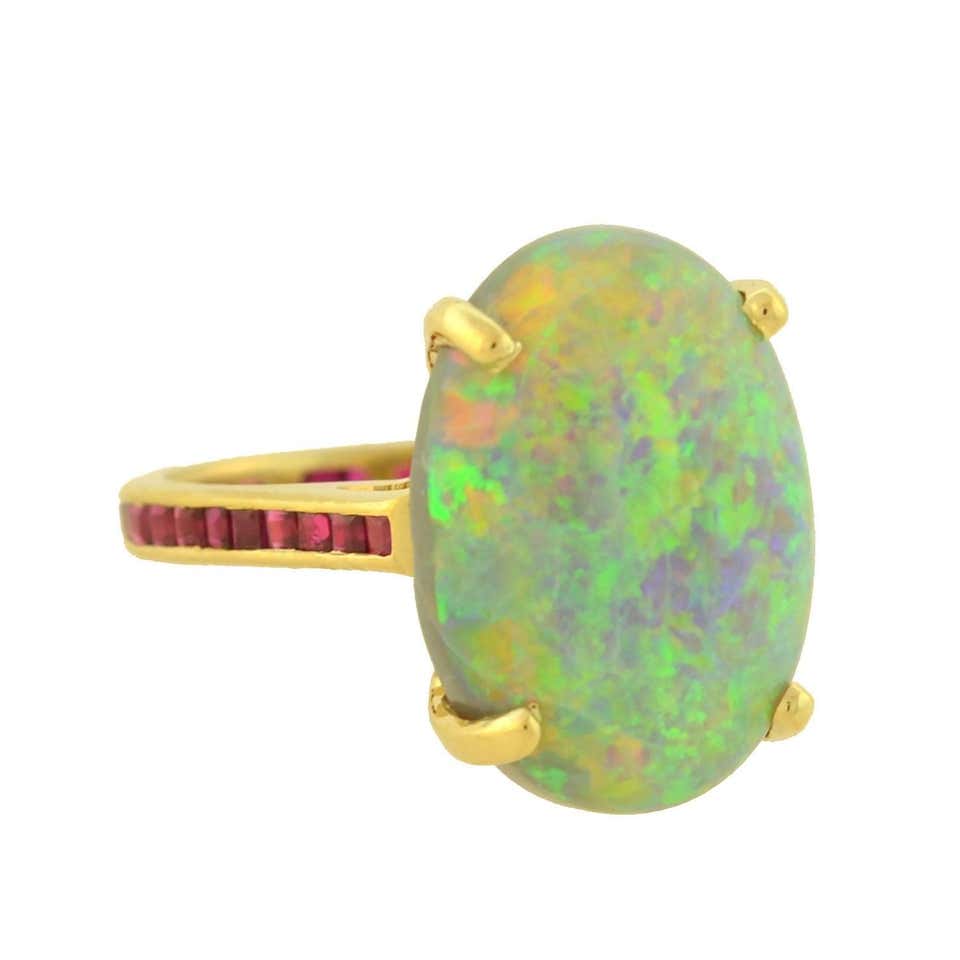 Estate 10.00 Carat Opal Ring with Calibrated Ruby Band at 1stDibs ...
