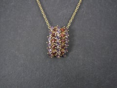 Estate 10k Amethyst Garnet and Diamond Pendant