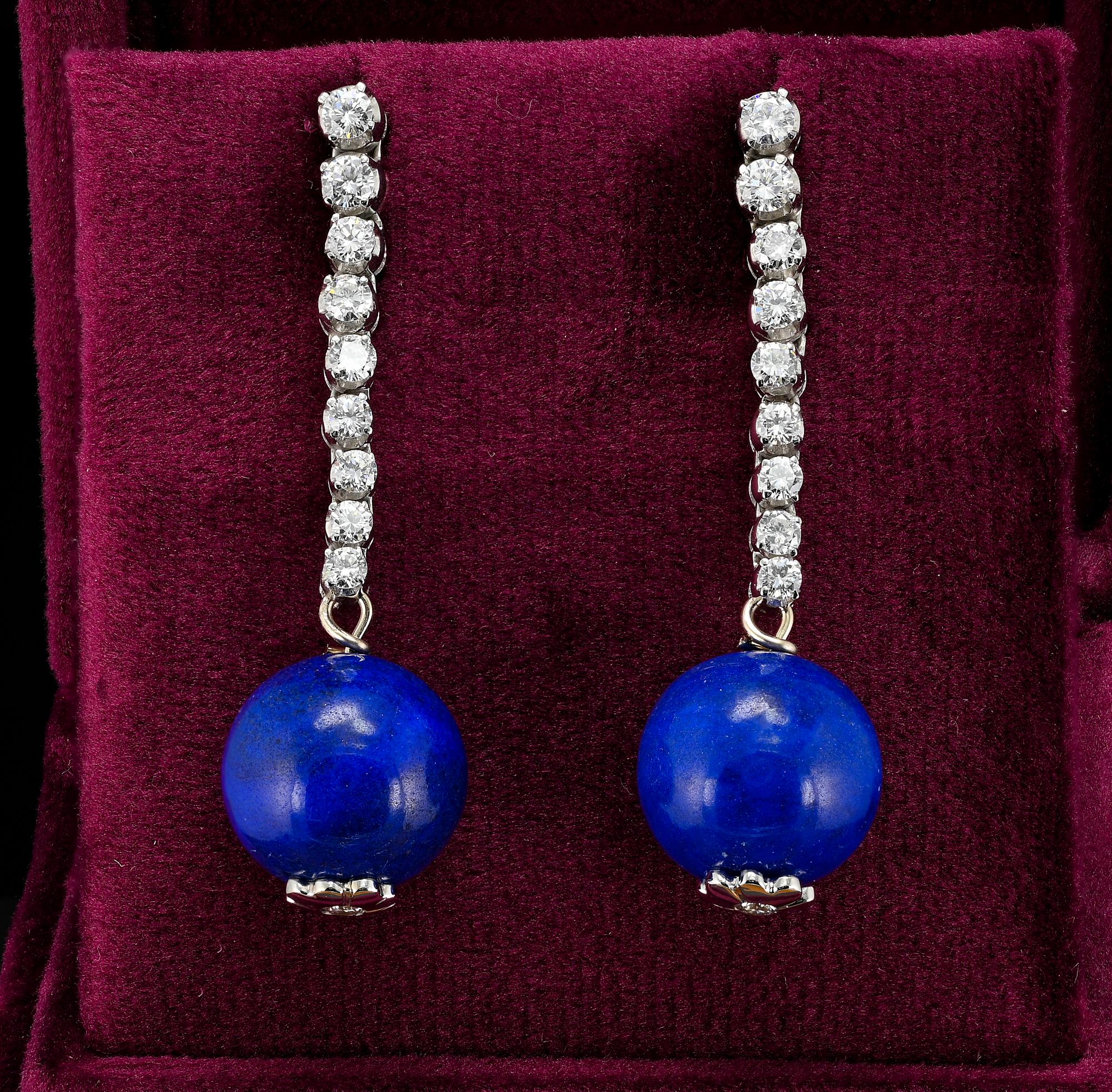These lovely estate long drop earrings drop are 1980 circa
Classy in style they sway and swing with lovely movement showing amazing sparkle and gorgeous Royal Blue color
Hand crafted of solid 18 KT white gold with a long Diamond line leading to an