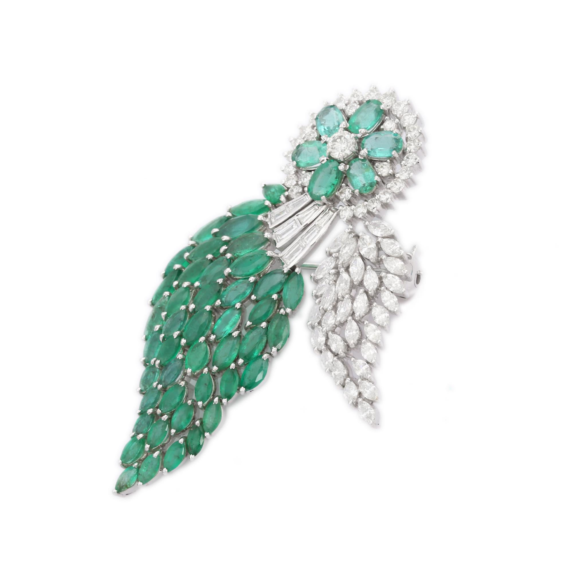 Estate 13.20 CTW Emerald 4.41 CTW Diamond Engagement Brooch in 18K White Gold which is a fusion of surrealism and pop-art, designed to make a bold statement. Crafted with love and attention to detail, this features 13.20 carats of emeralds and 4.41