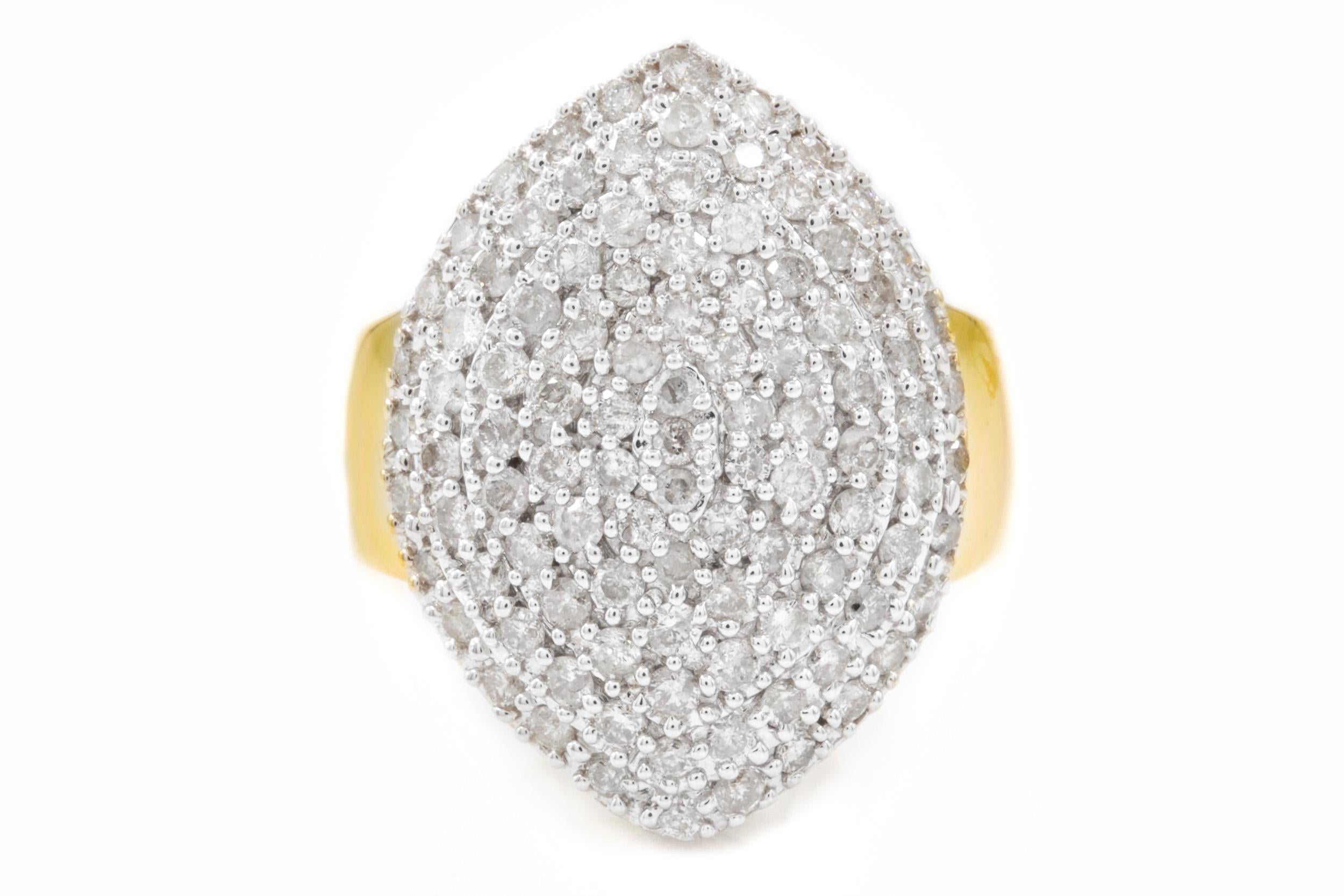 14K YELLOW GOLD AND DIAMOND CLUSTER RING
Size 8 1/4  14.5 grams total weight 
Item # C104216 

We love the chic aesthetics of this very dramatic ring, the oversized domed ovular body executed in white gold with an endless array of pave-set round-cut