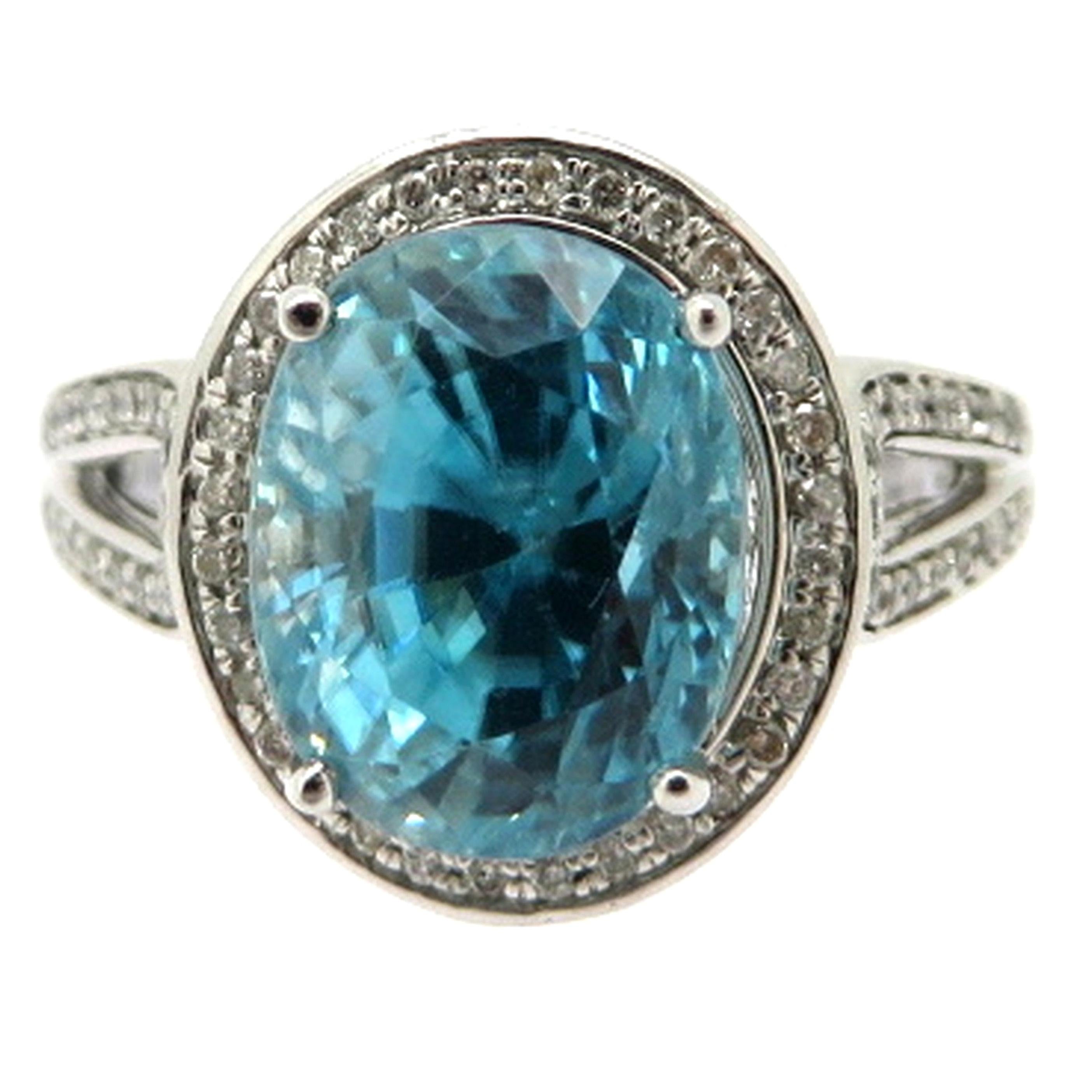 Estate 14 Karat White Gold 5.00 Carat Blue Zircon and Diamond Halo Fashion Ring