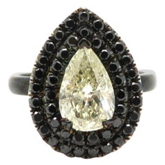 Used Estate 14 Karat White Gold Black Rhodium 1.50 Carat Pear Shaped Diamond Ring