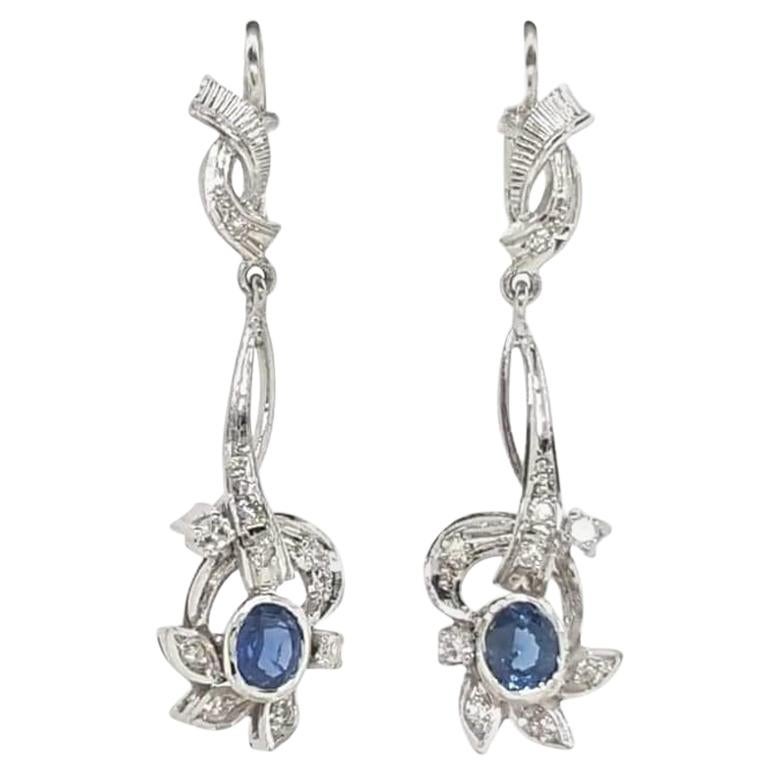 Estate 14 Karat White Gold Oval Blue Sapphire and Diamond Leverback Earrings For Sale