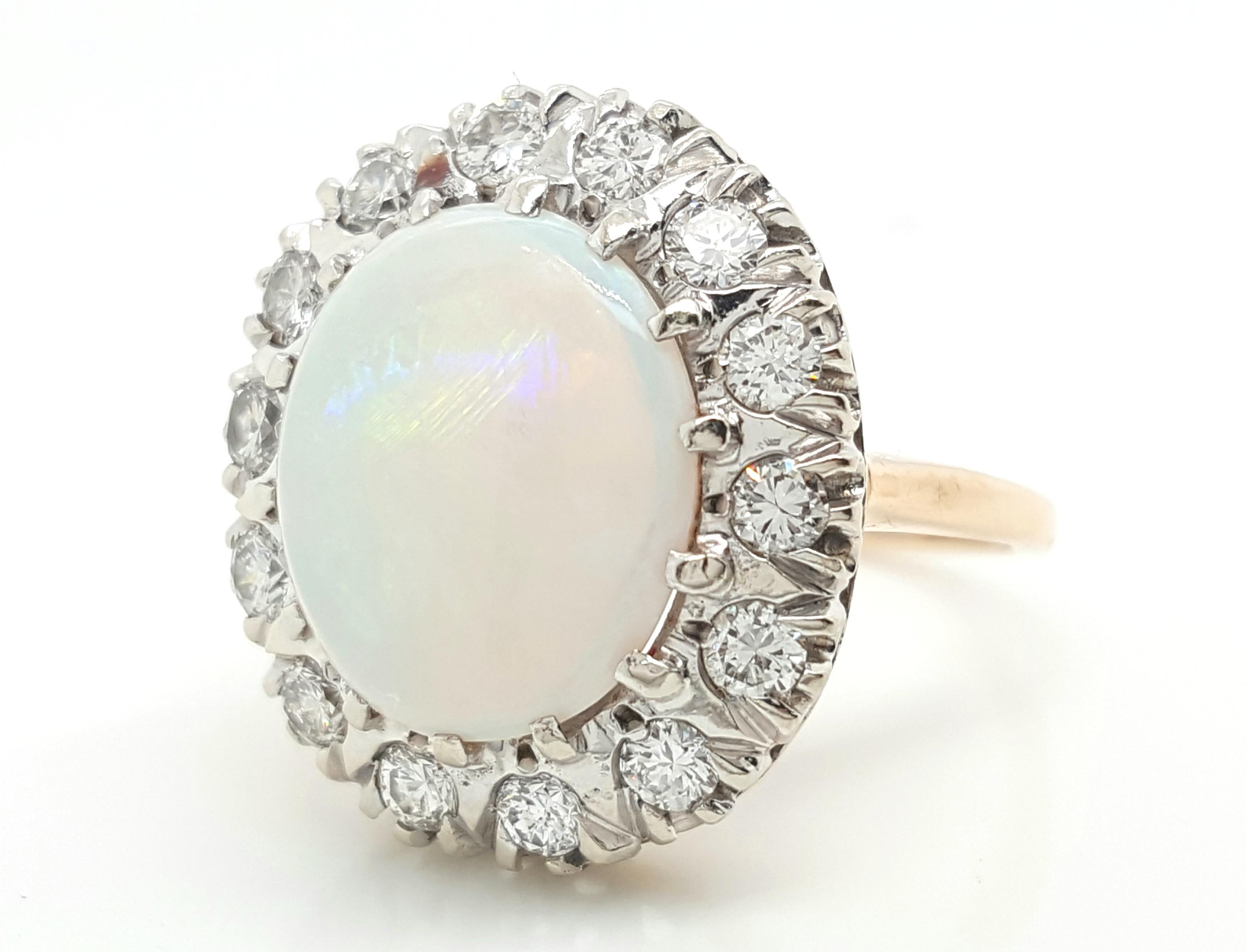 Contemporary Estate 14 Karat Yellow and White Gold Oval Opal and Diamond Cocktail Ring For Sale