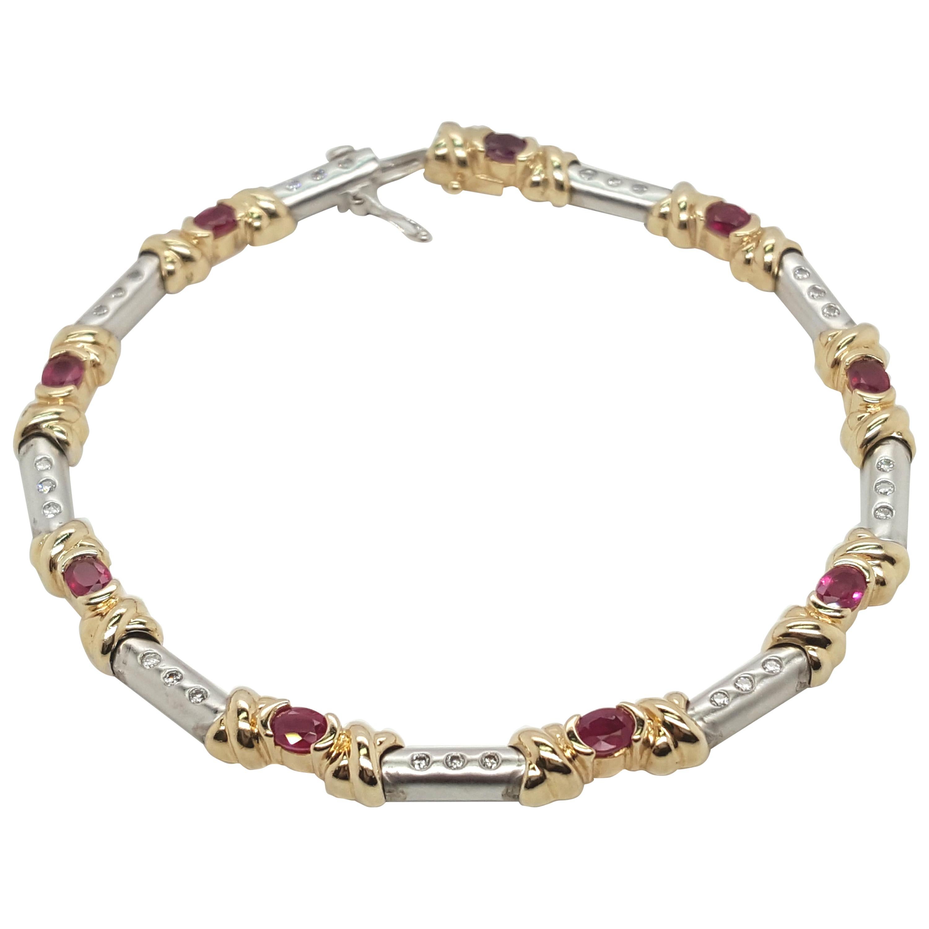 Pulsera Estate de oro amarillo y blanco de 14 quilates con diamantes y rubíes ovalados