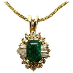 Estate 14 Karat Yellow Gold Emerald and Diamond Cluster Necklace