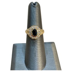 Estate 14 Karat Yellow Gold Oval Sapphire and Diamond Ring